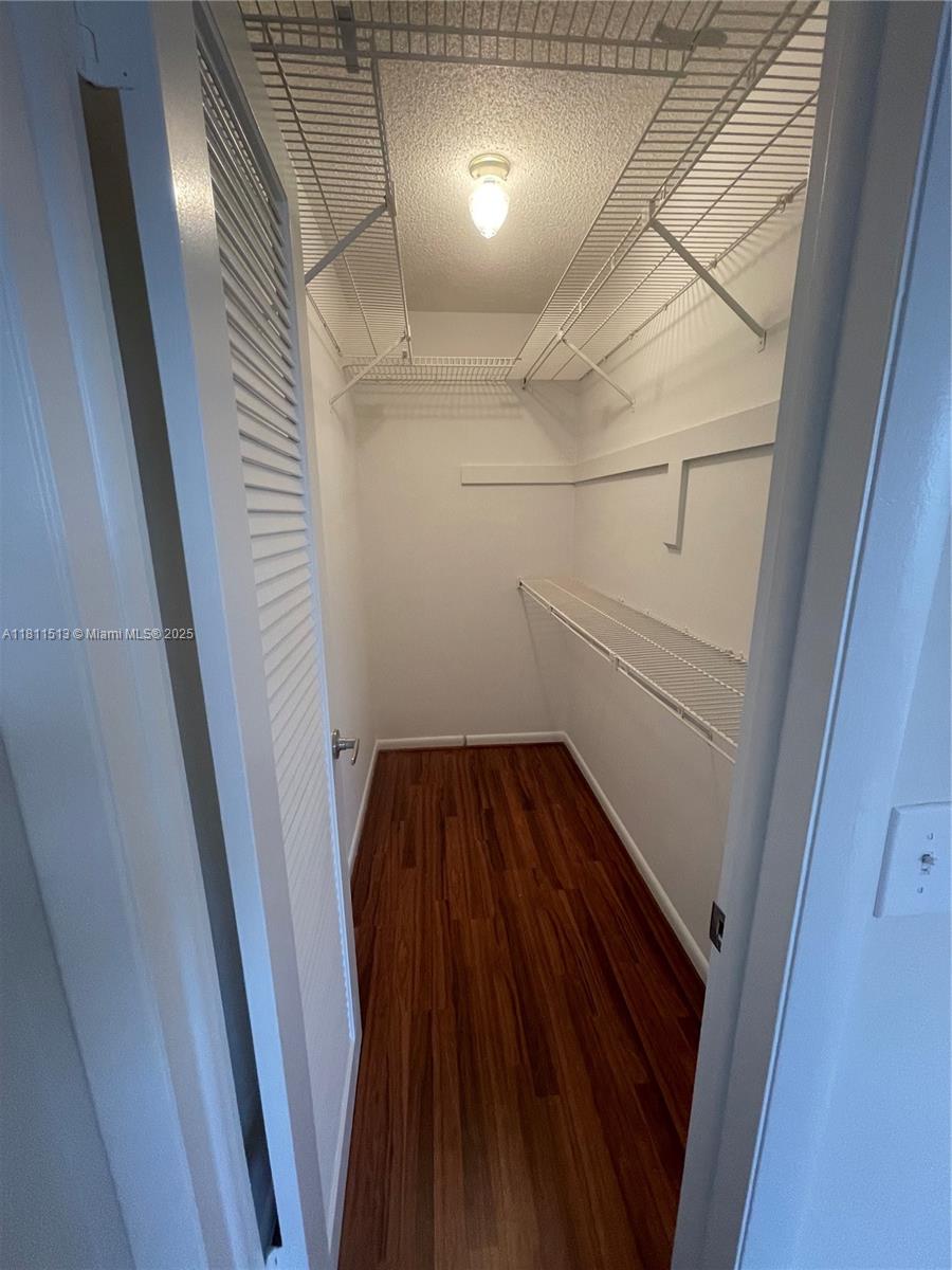 413 Saxony Way, Unit 413 Delray Beach, FL 33446 - Photo 6 of 14 a view of a hallway