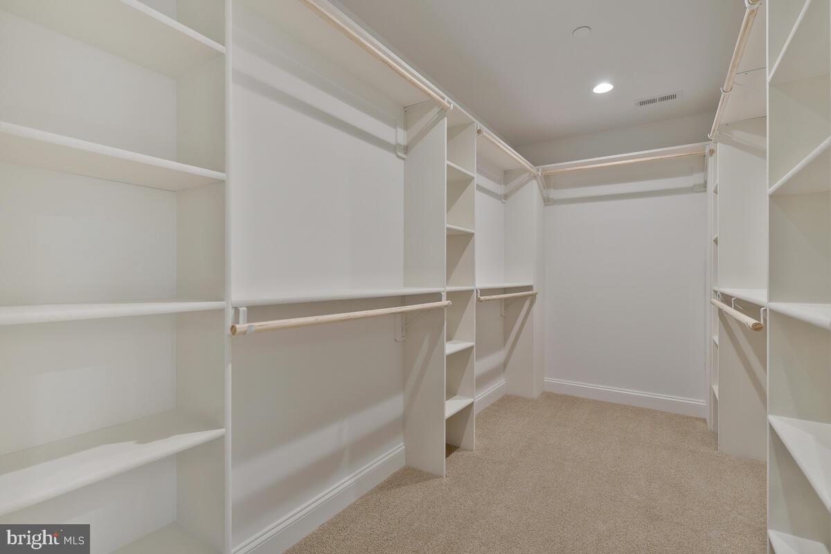 6780 Hungerford Road Bryans Road, MD 20616 - Photo 29 of 54 1 of the custom closets with wooden shelves