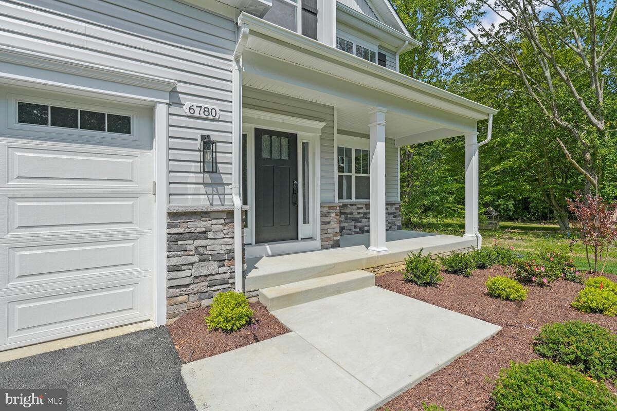 6780 Hungerford Road Bryans Road, MD 20616 - Photo 46 of 54 Sidewalk and landscaping