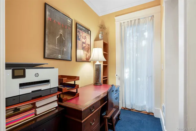 a room with furniture and wooden floor