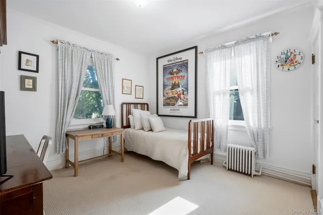 a room with furniture and a window