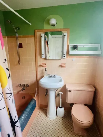 a bathroom with a bath tub