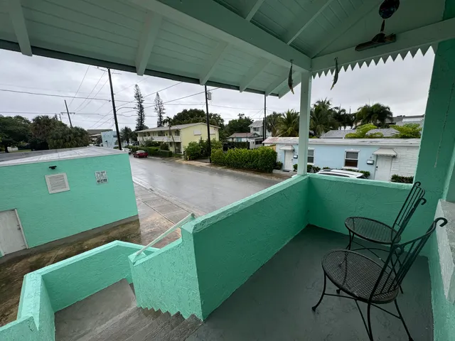 a view of a chairs and table in the patio