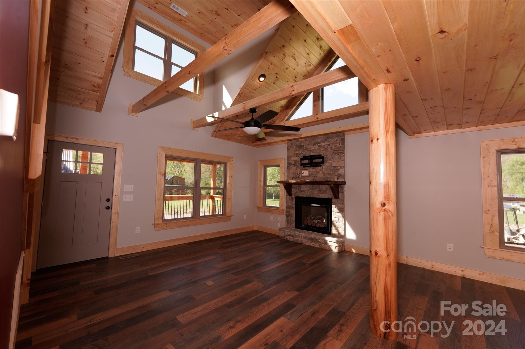 54 Alex Ridge Maggie Valley, NC 28751 - Photo 19 of 35 wooden floor in an empty room with a window