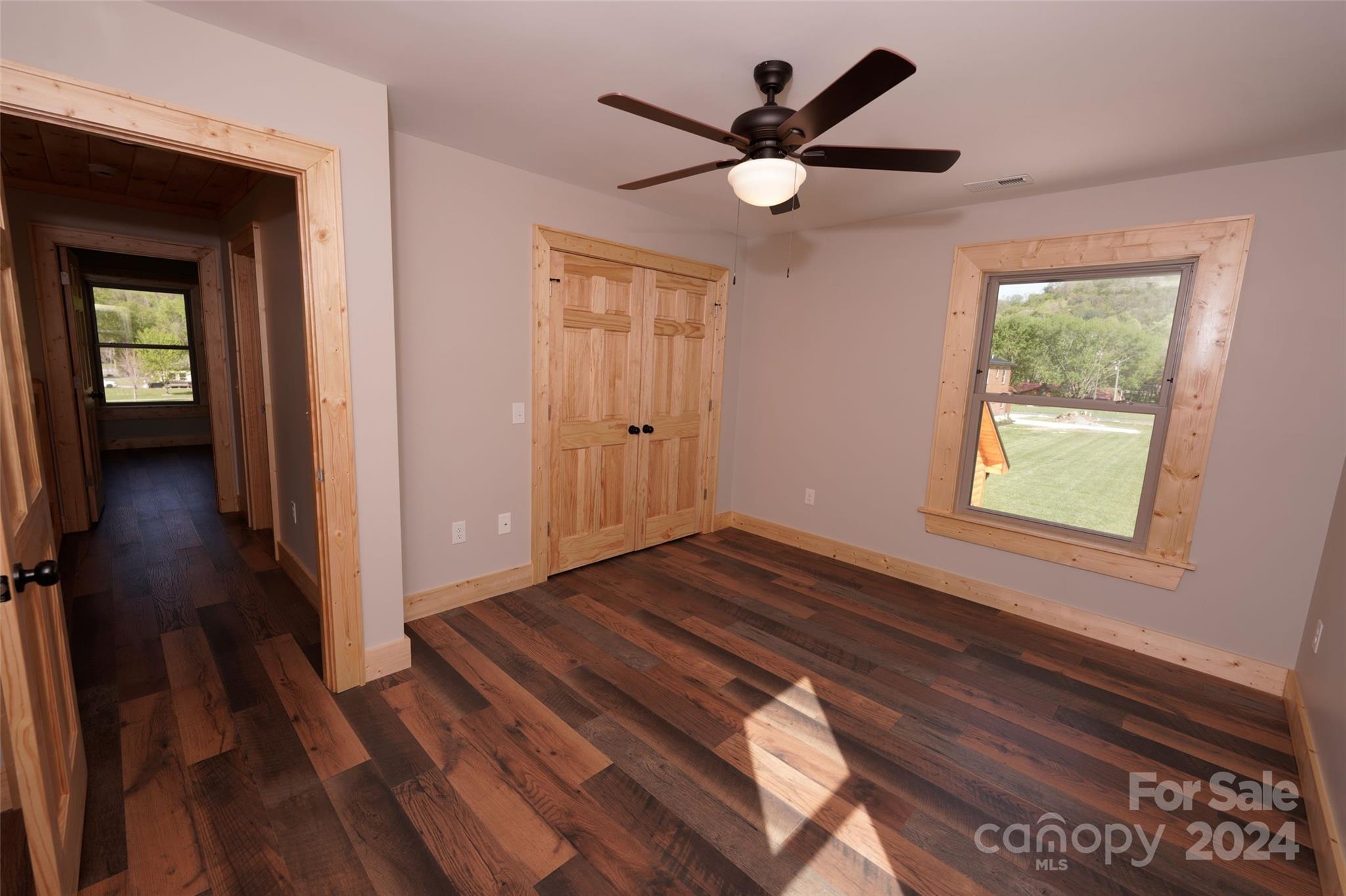 54 Alex Ridge Maggie Valley, NC 28751 - Photo 29 of 35 wooden floor in an empty room with a window