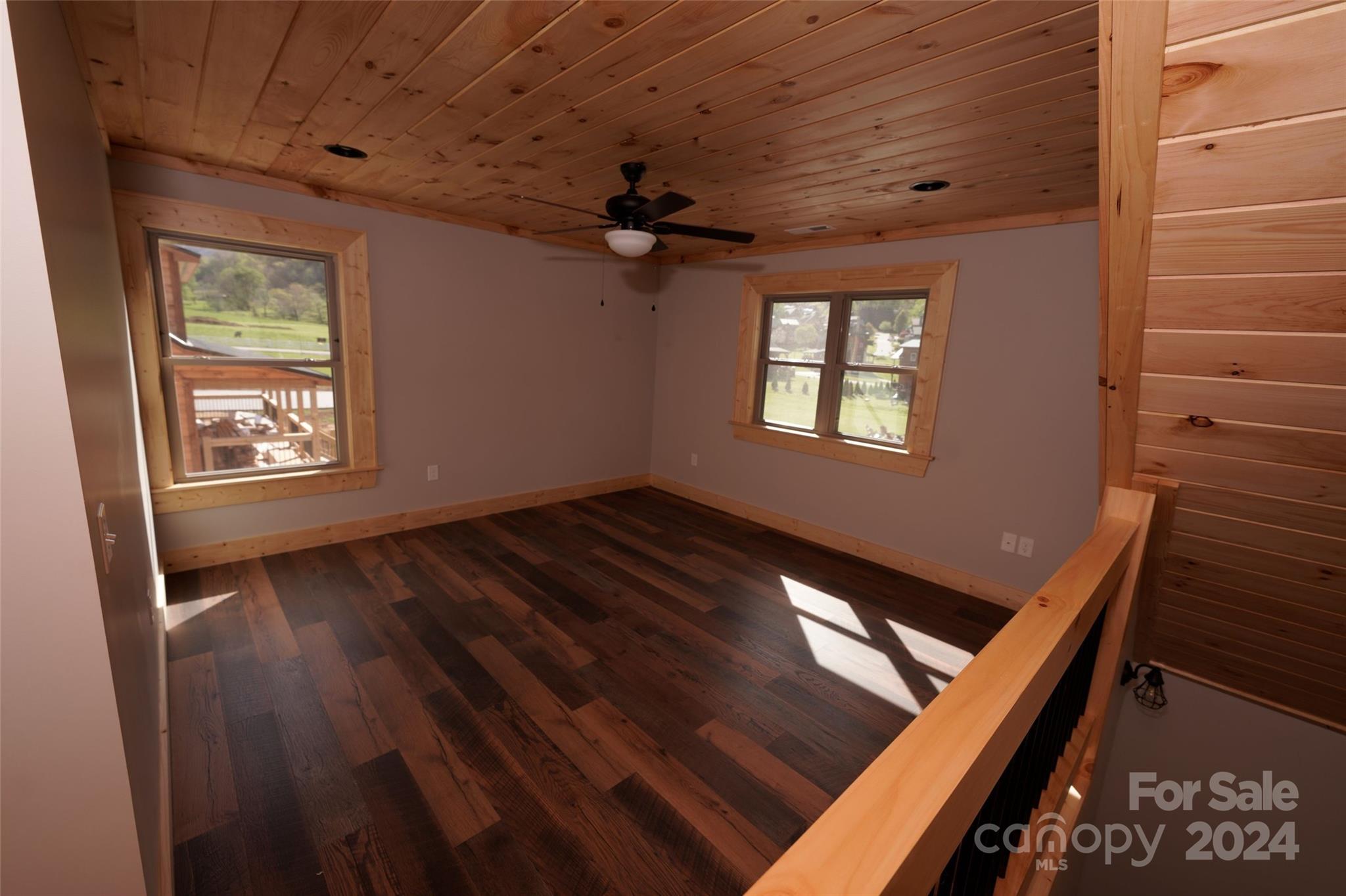 54 Alex Ridge Maggie Valley, NC 28751 - Photo 31 of 35 a view of an empty room with a window