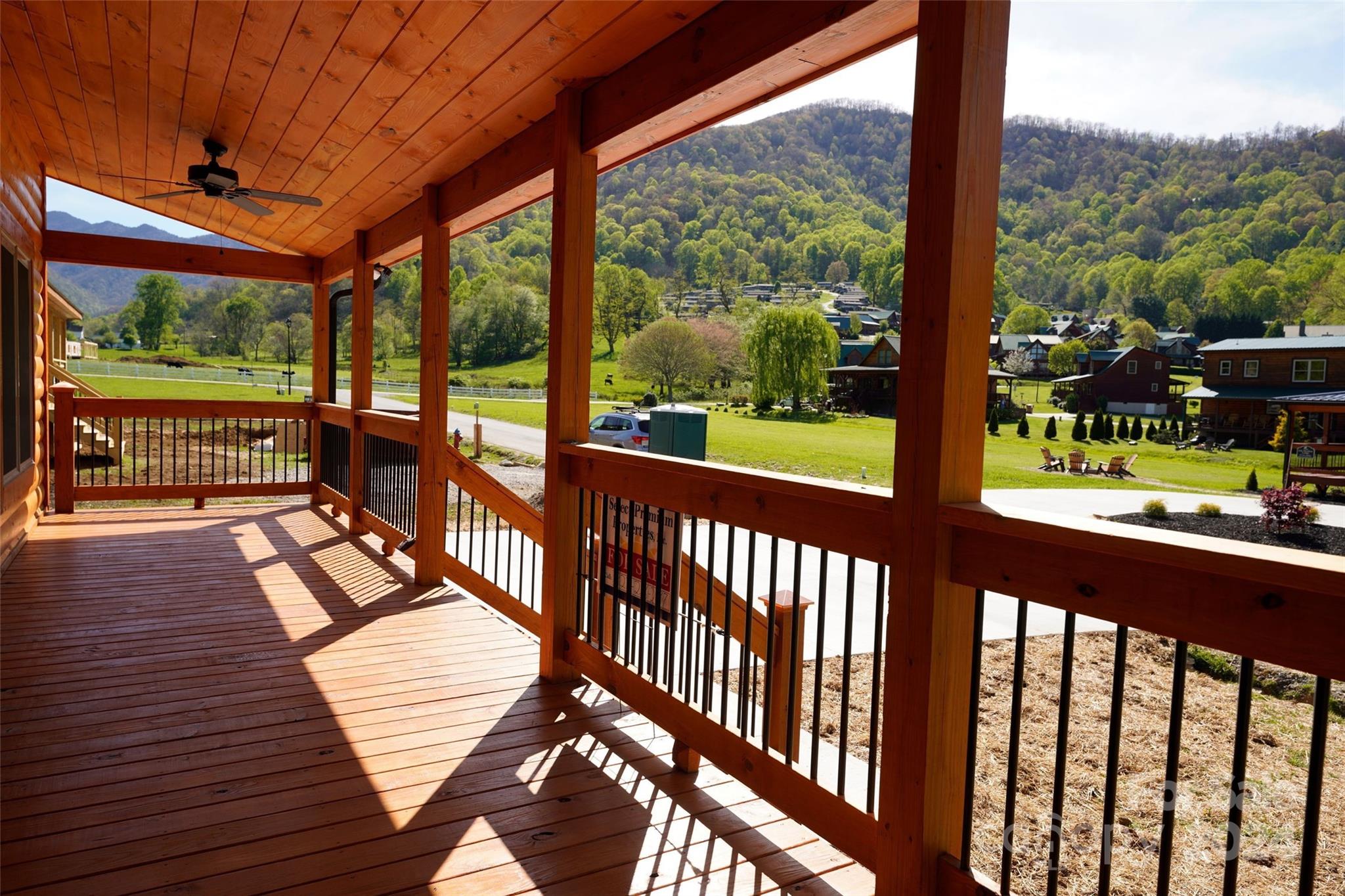 54 Alex Ridge Maggie Valley, NC 28751 - Photo 6 of 35 a view of a balcony with wooden floor