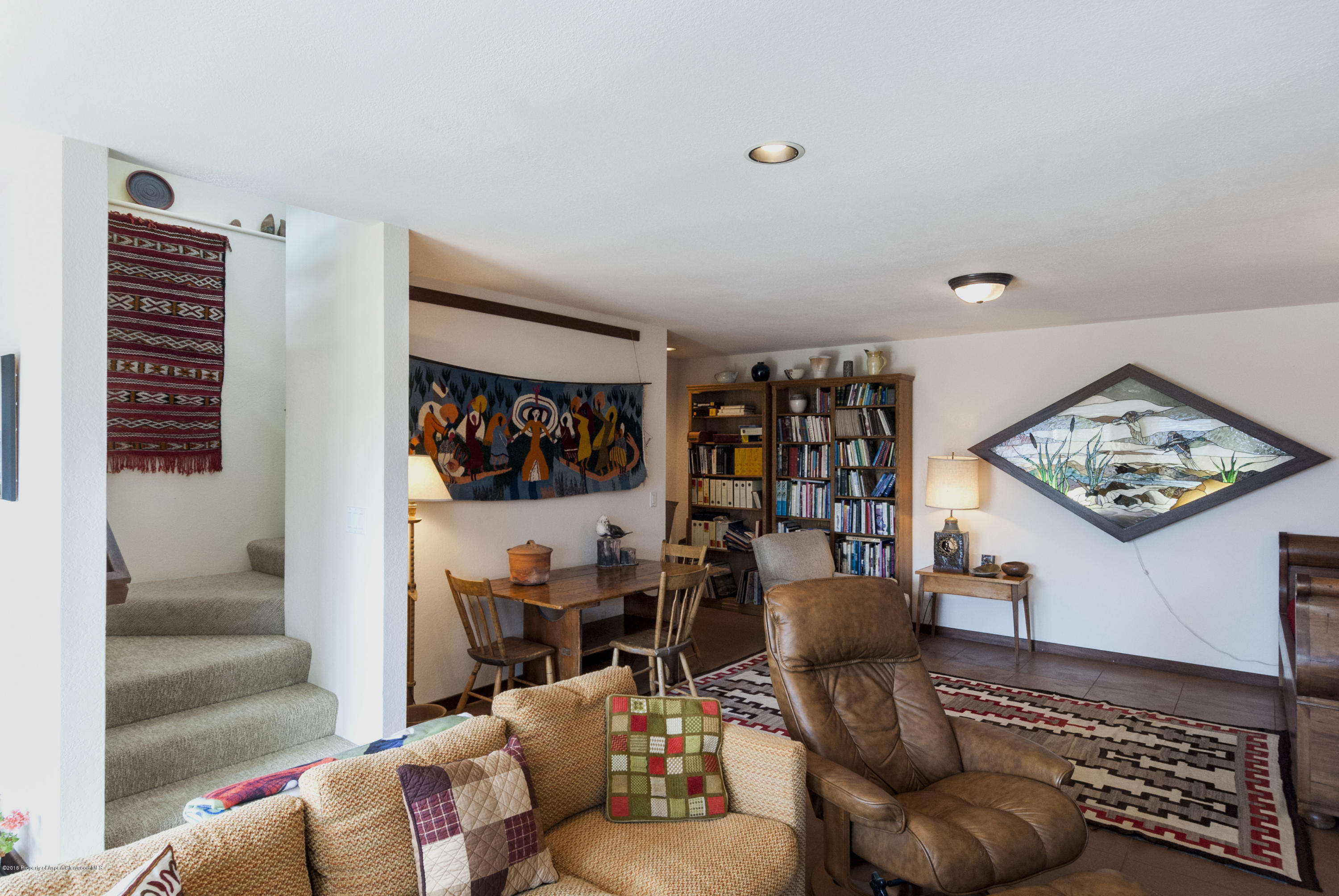 550 Wooden Deer Road Carbondale, CO 81623 - Photo 17 of 21 a living room with furniture and wooden floor