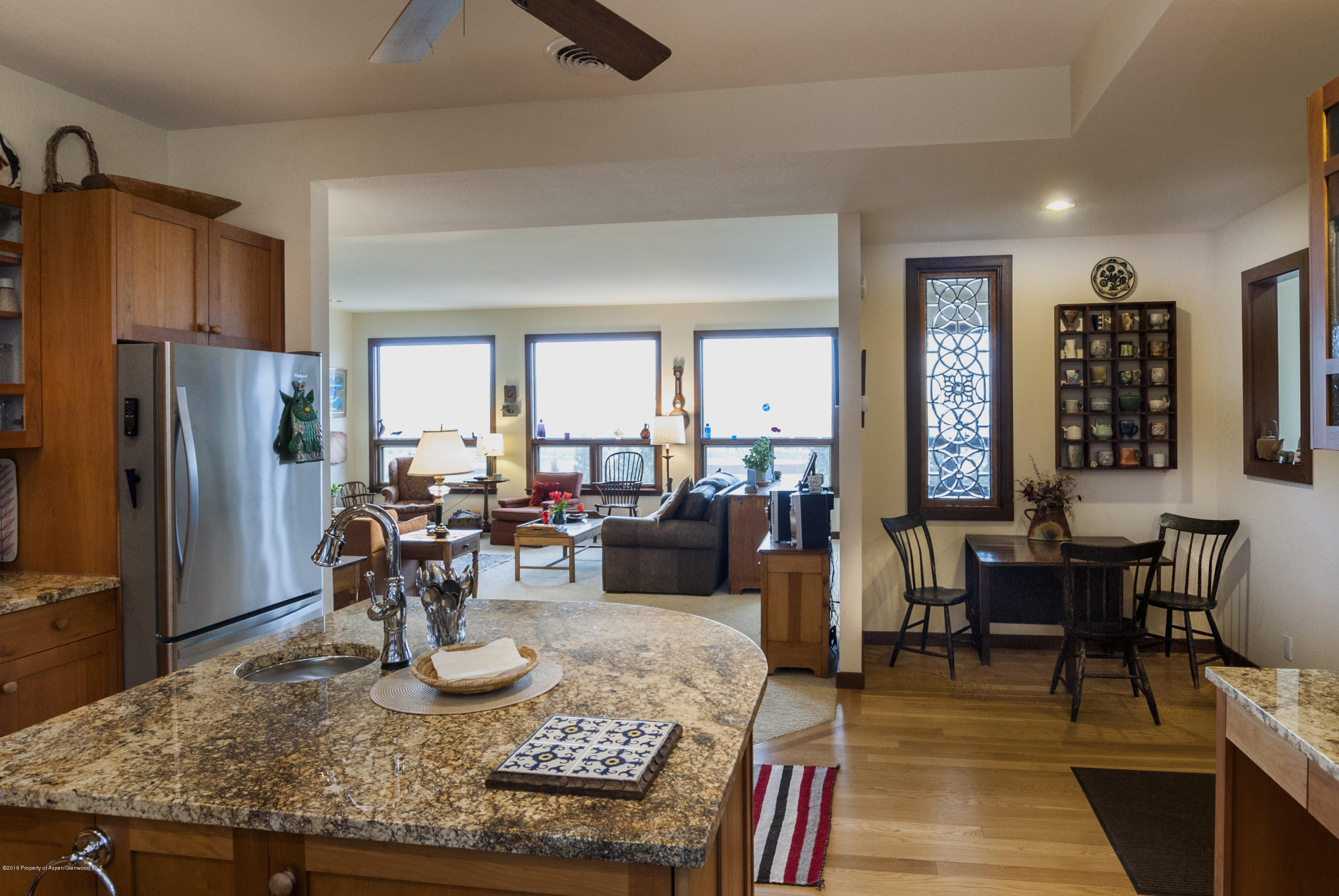 550 Wooden Deer Road Carbondale, CO 81623 - Photo 4 of 21 a living room with furniture granite countertop kitchen view and a dining table