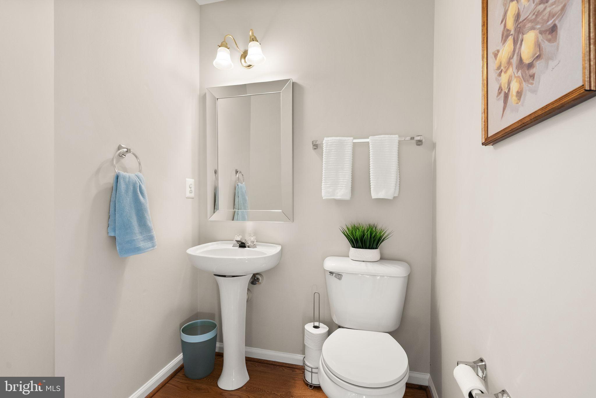 20544 Morningside Terrace Sterling, VA 20165 - Photo 23 of 54 a bathroom with a toilet sink and mirror