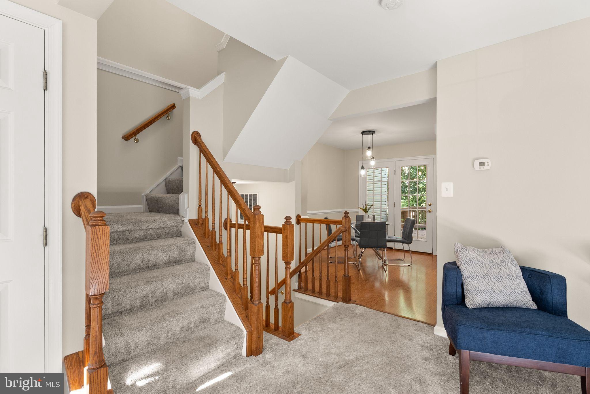 20544 Morningside Terrace Sterling, VA 20165 - Photo 24 of 54 a view of a livingroom with furniture and staircase
