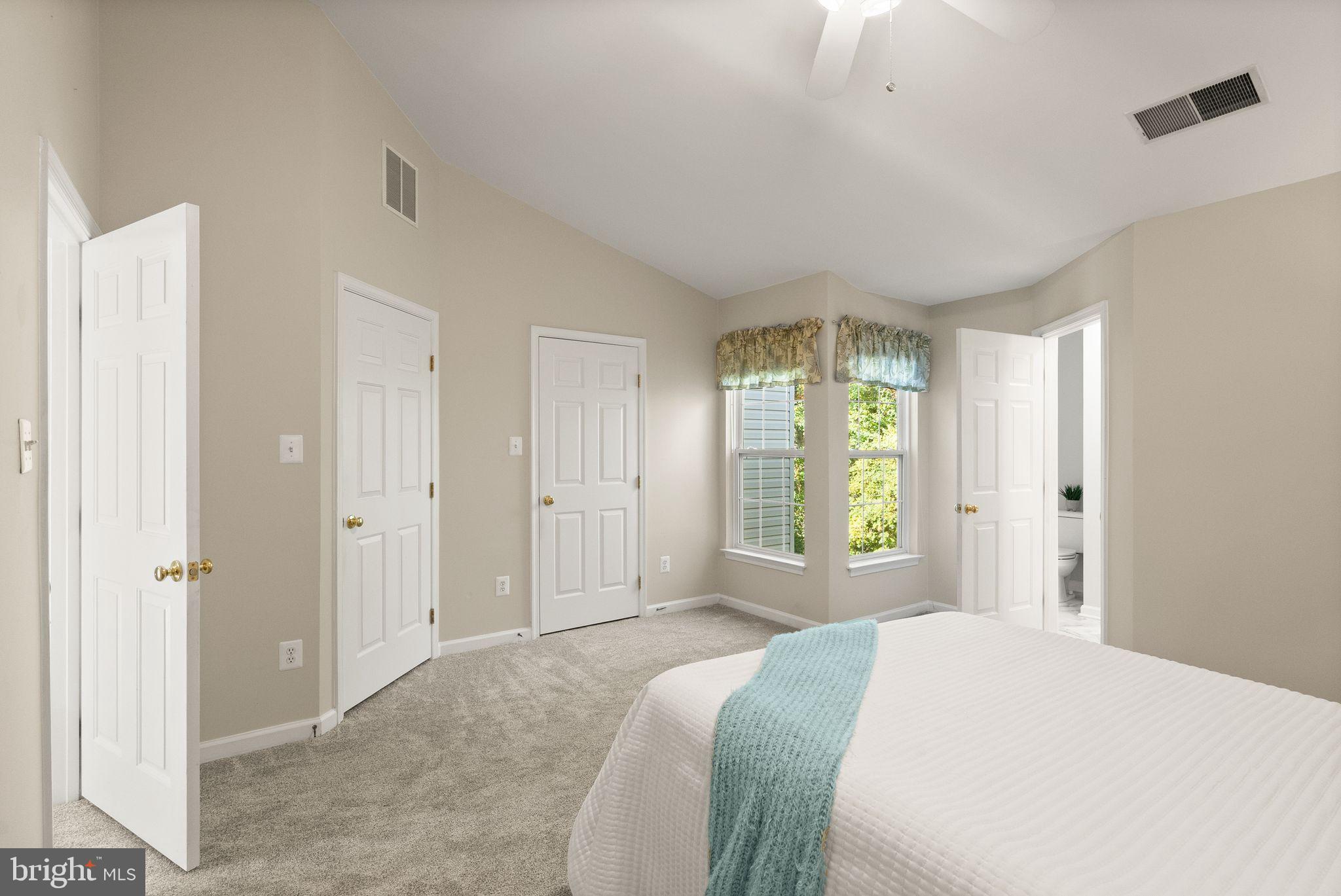 20544 Morningside Terrace Sterling, VA 20165 - Photo 27 of 54 a bedroom with a bed and a window