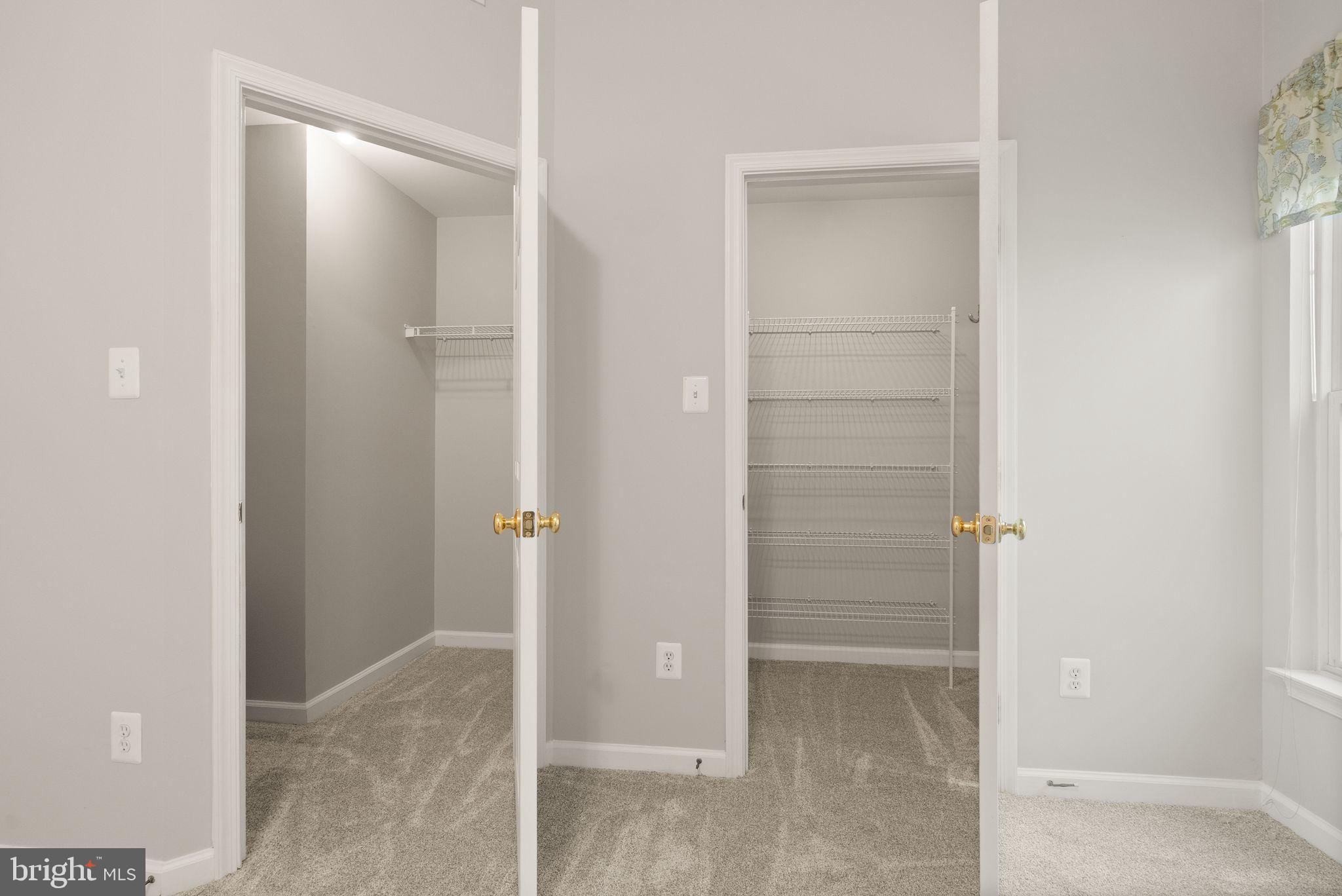 20544 Morningside Terrace Sterling, VA 20165 - Photo 32 of 54 Primary walk-in closets