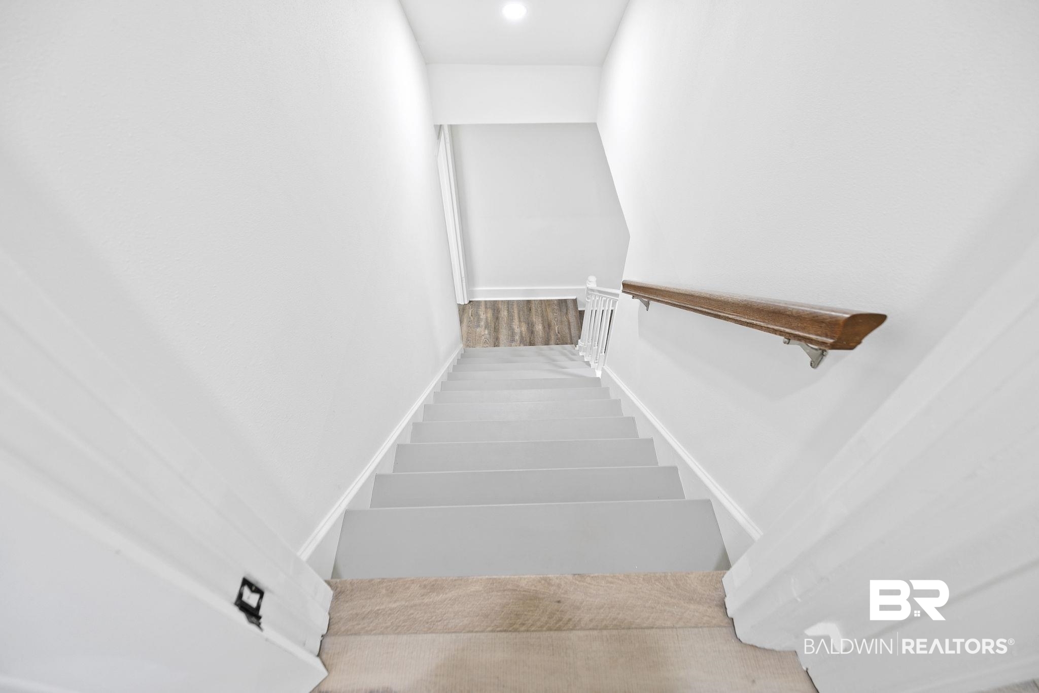 342 Ridgewood Drive Daphne, AL 36526 - Photo 18 of 36 Staircase with hardwood / wood-style floors