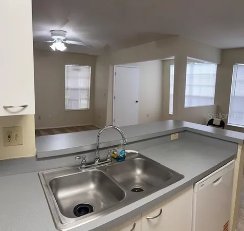 a room with a sink and a window