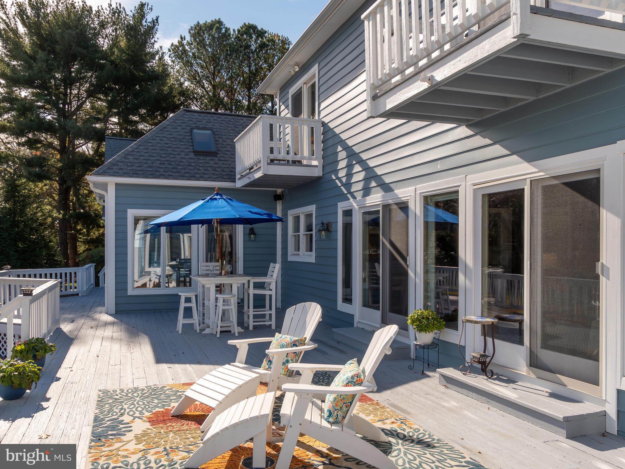 9191 Deepwater Point Road St. Michaels, MD 21663 - Photo 19 of 103 Porch and Balconies with waterfront view.