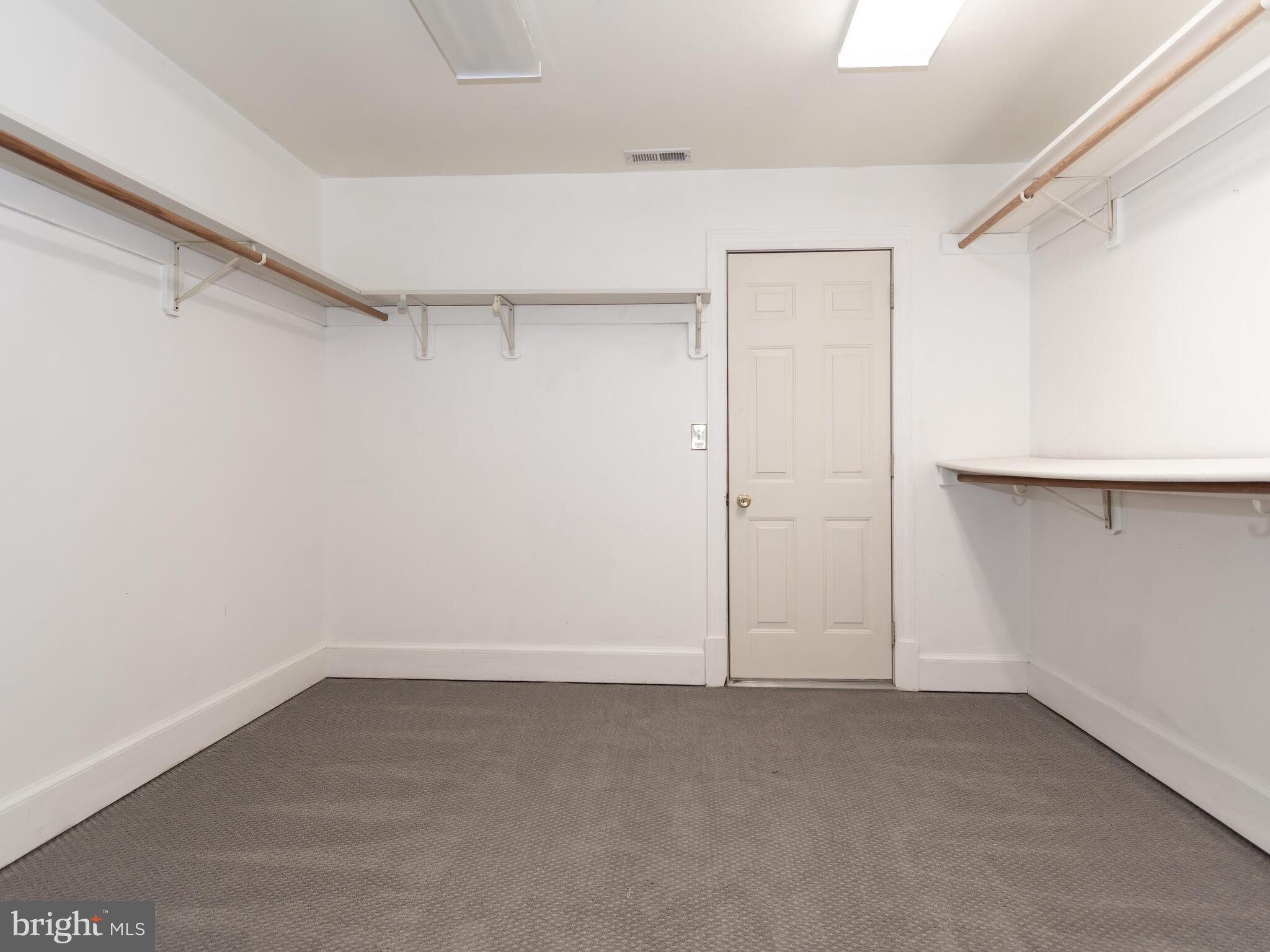 9191 Deepwater Point Road St. Michaels, MD 21663 - Photo 77 of 103 Large Walk in Closet with door to more storage