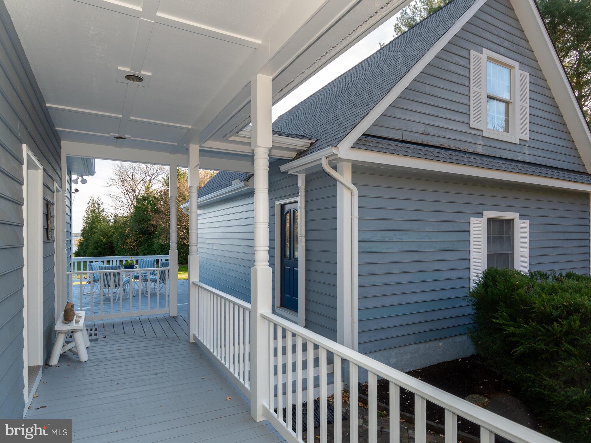 9191 Deepwater Point Road St. Michaels, MD 21663 - Photo 78 of 103 Wraparound Porch between garage