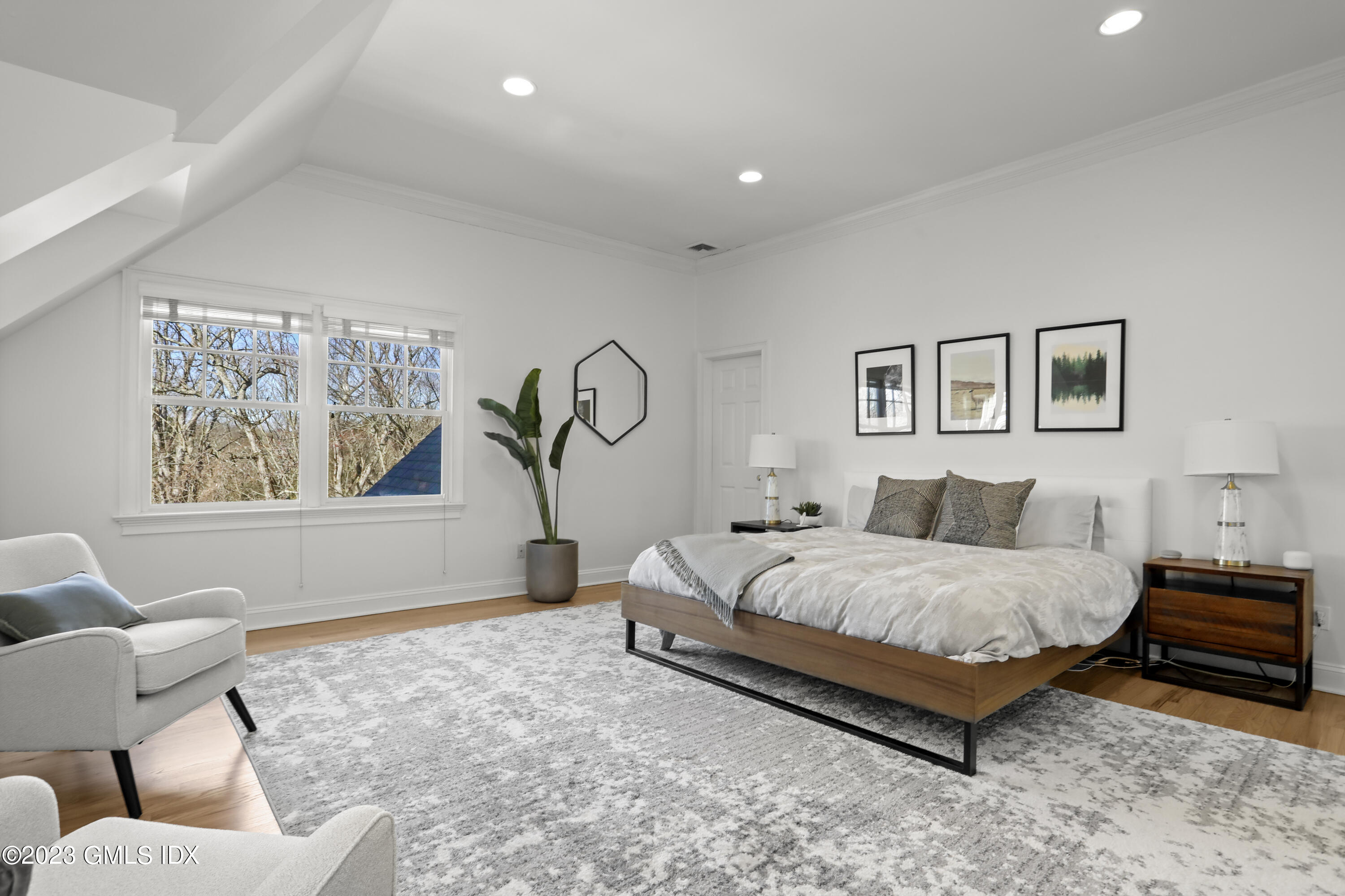 192 Bible Street Cos Cob, CT 06807 - Photo 18 of 32 a bedroom with a bed and a couch