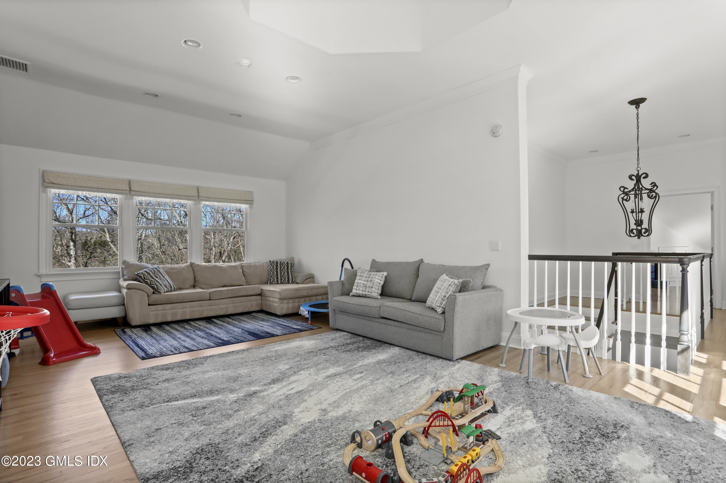 192 Bible Street Cos Cob, CT 06807 - Photo 21 of 32 a living room with furniture and a window