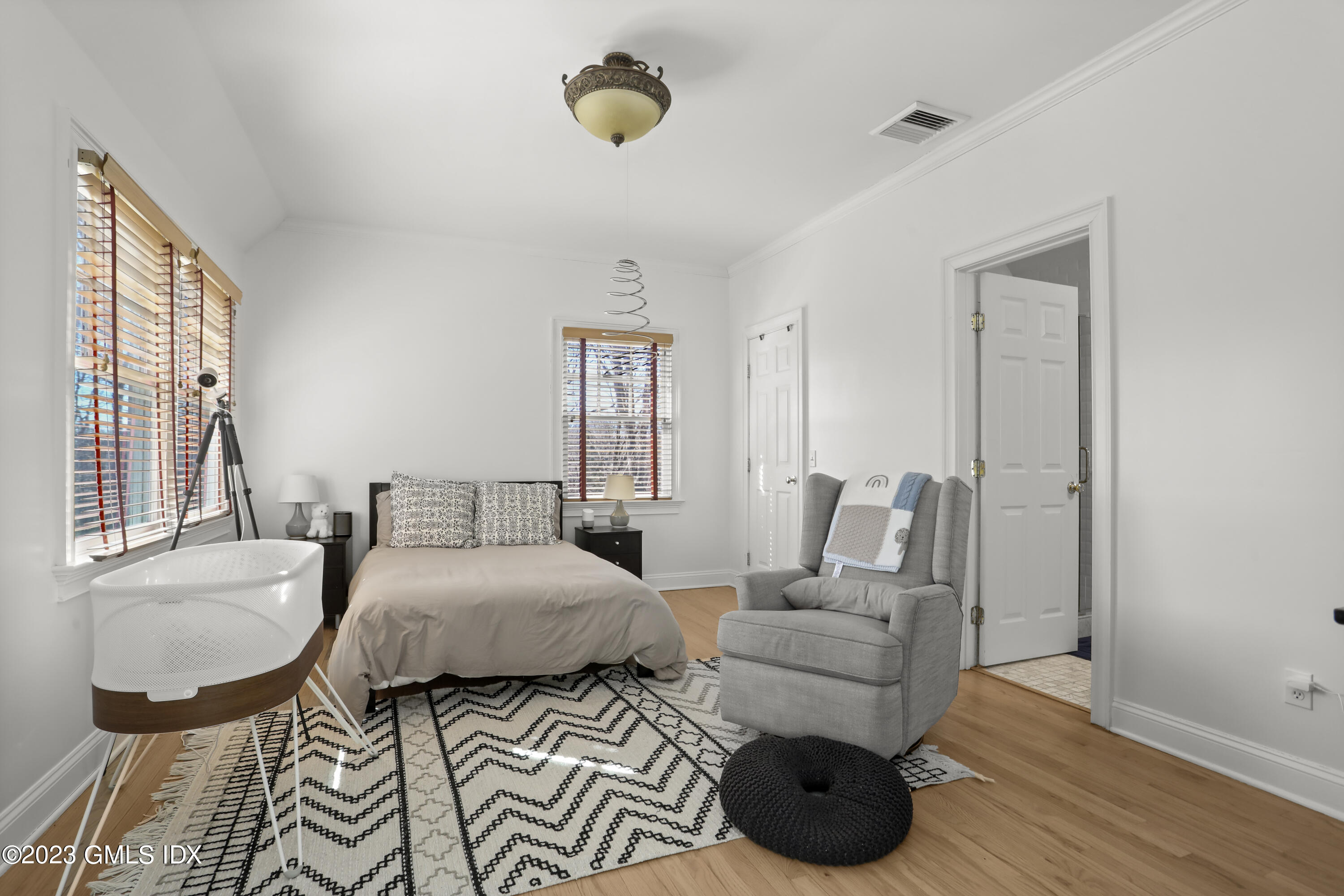 192 Bible Street Cos Cob, CT 06807 - Photo 23 of 32 a bedroom with furniture and a window