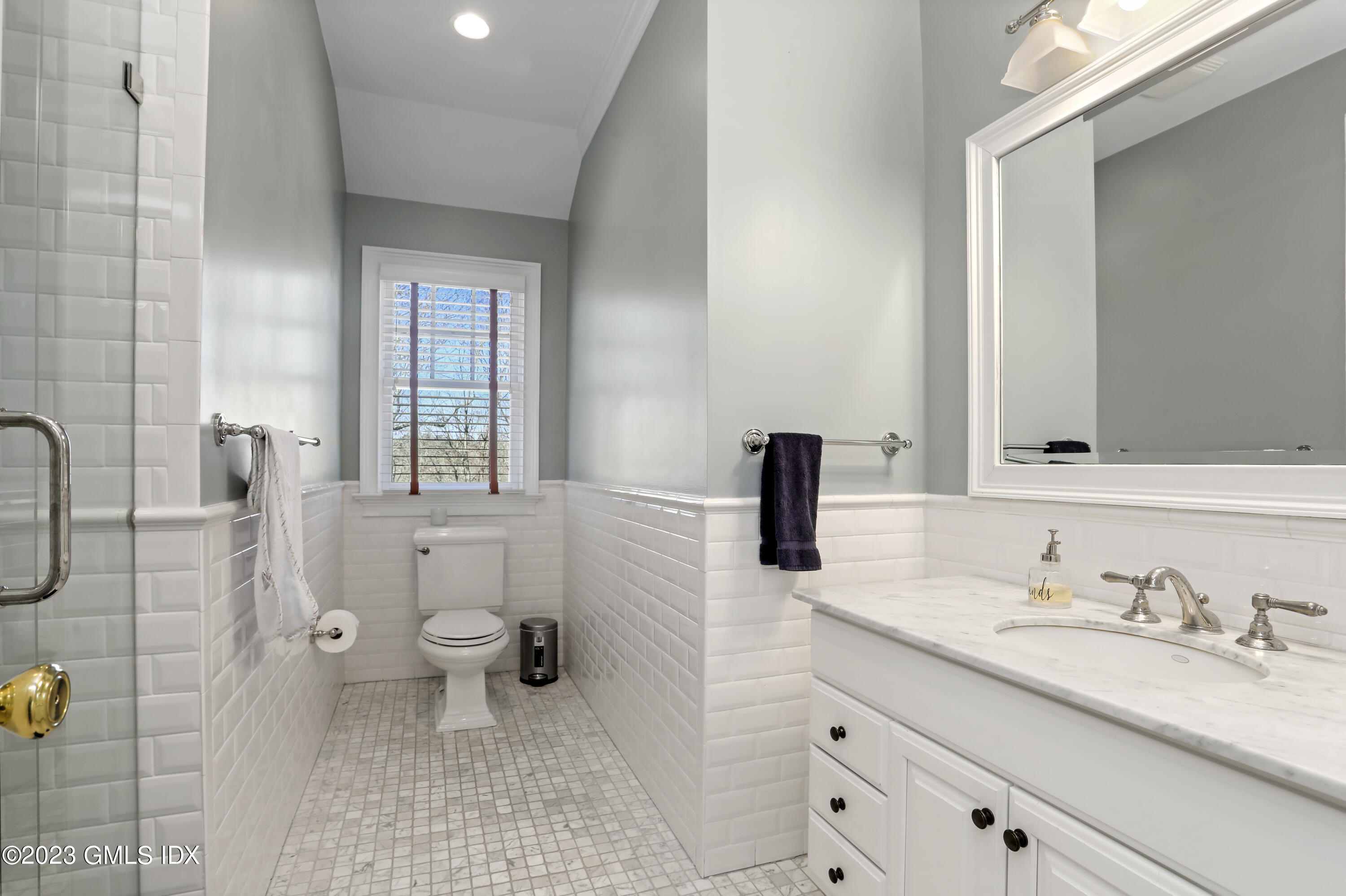 192 Bible Street Cos Cob, CT 06807 - Photo 24 of 32 a bathroom with a granite countertop toilet sink and mirror