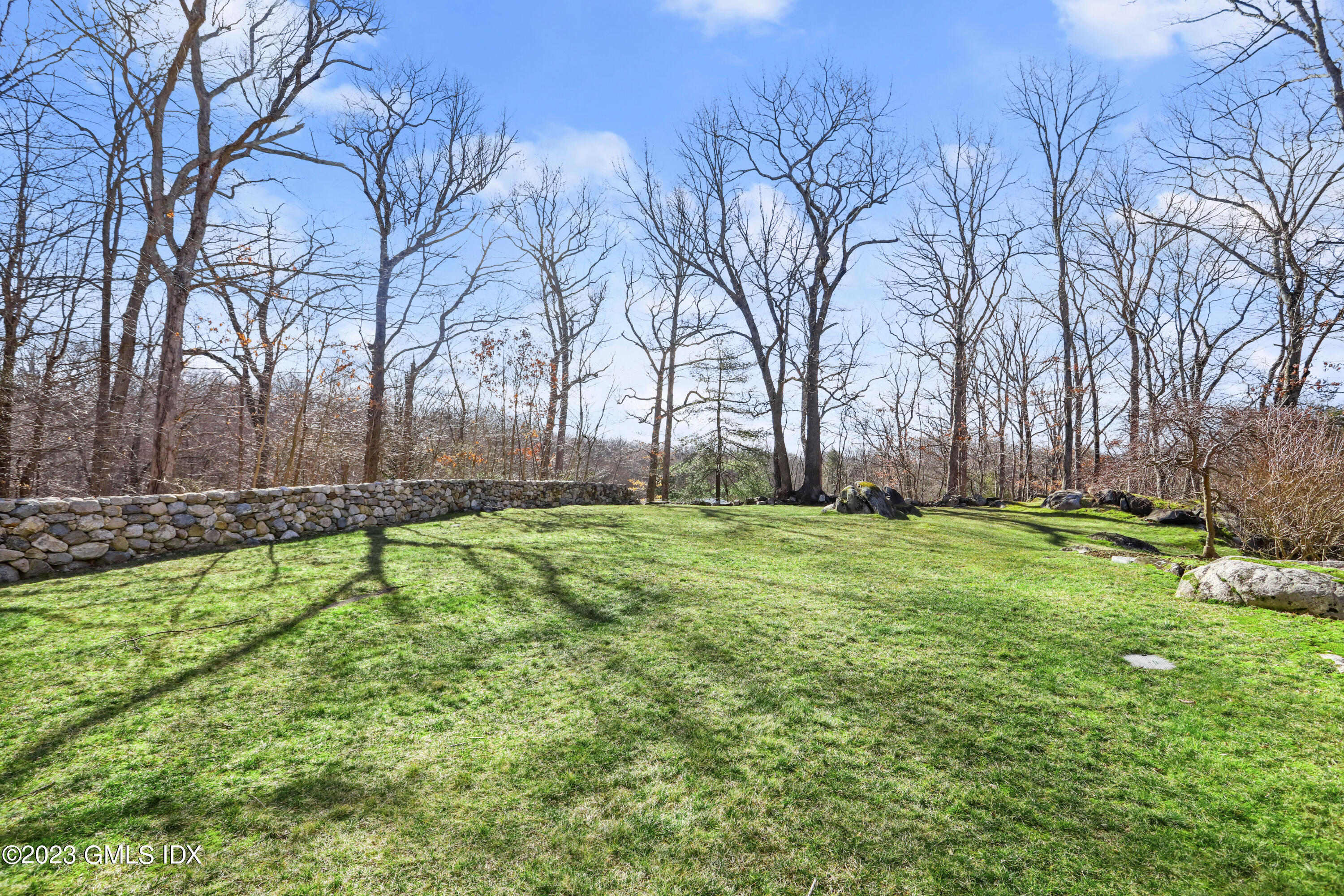 192 Bible Street Cos Cob, CT 06807 - Photo 27 of 32 a view of yard with green space