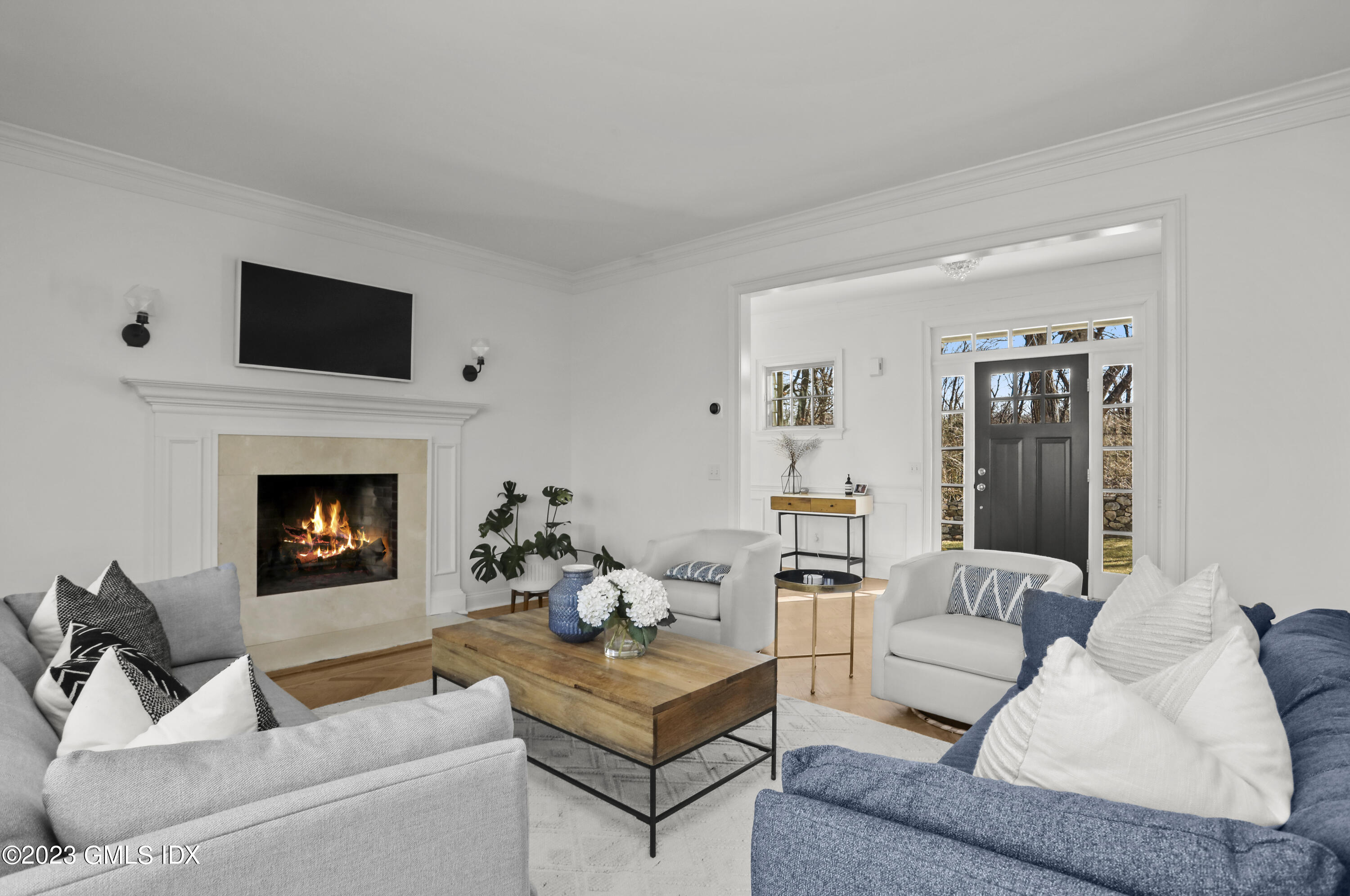 192 Bible Street Cos Cob, CT 06807 - Photo 4 of 32 a living room with furniture and a fireplace