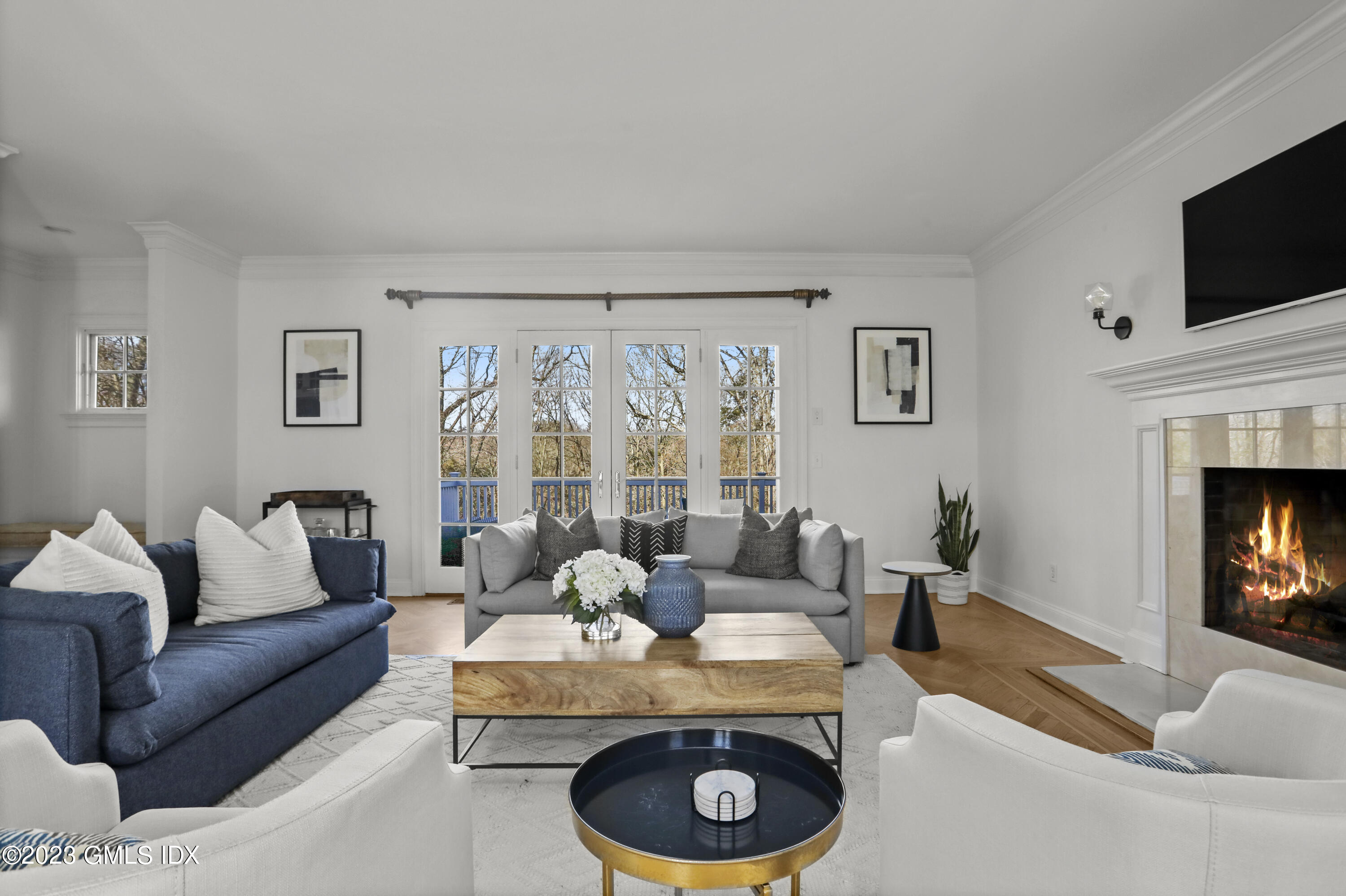 192 Bible Street Cos Cob, CT 06807 - Photo 5 of 32 a living room with furniture and a fireplace