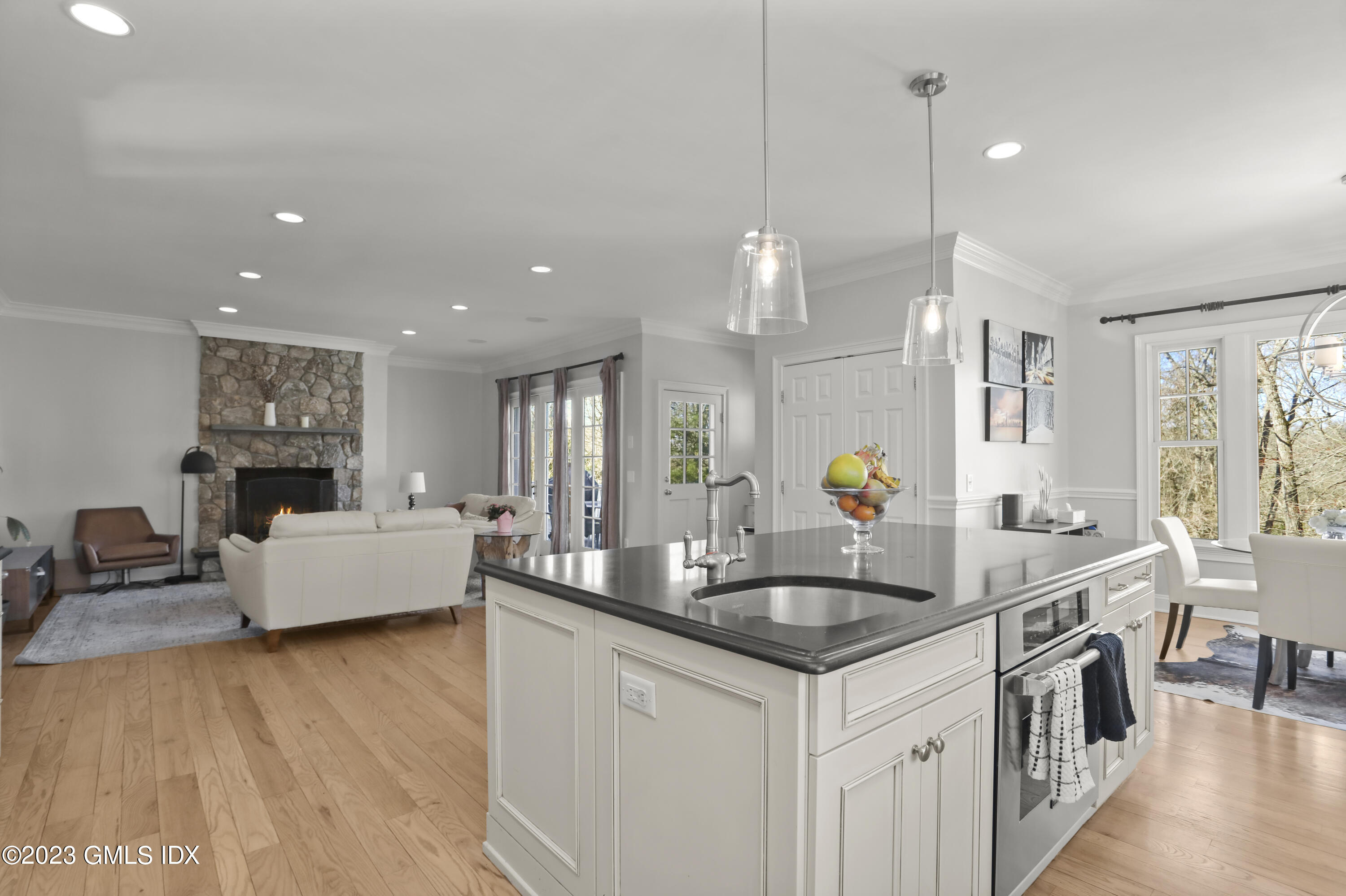 192 Bible Street Cos Cob, CT 06807 - Photo 9 of 32 a kitchen with counter top space and living room