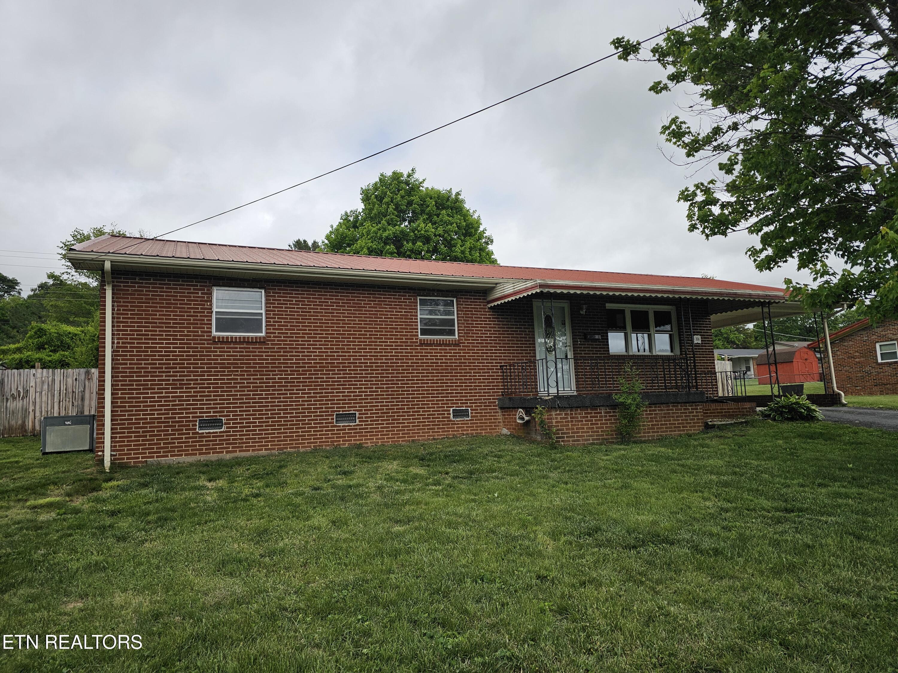 306 Wilson Hurst Street Tazewell, TN 37879 - Photo 1 of 16 20260428_131300