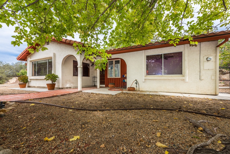 28403 Valley Center Road Valley Center, CA 92082 - Photo 2 of 25 Your hacienda hideaway awaits! You are going to love this private oasis with quaint patios and wonderful room to roam.