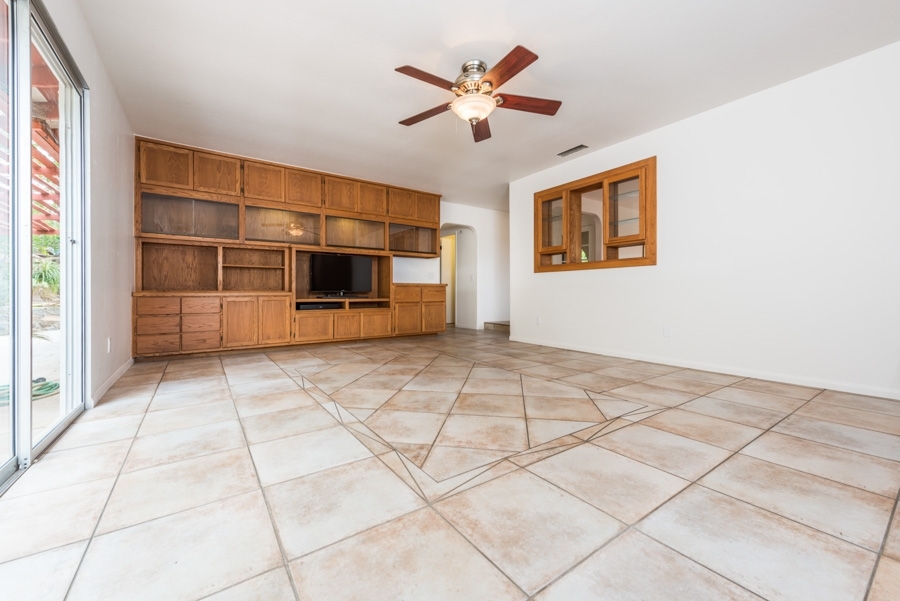 28403 Valley Center Road Valley Center, CA 92082 - Photo 11 of 25 Tile flooring and wonderful built in area for displaying your treasures and television.