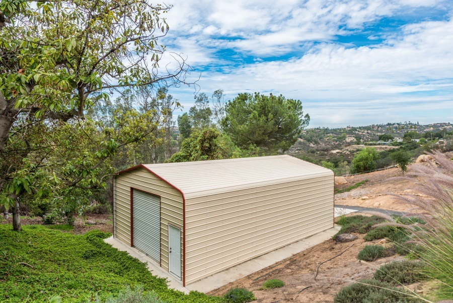 28403 Valley Center Road Valley Center, CA 92082 - Photo 24 of 25 Wonderful metal building that will hold 4 cars no problem and maybe more! It has 2 roll up doors and a pedestrian door on a concrete pad..