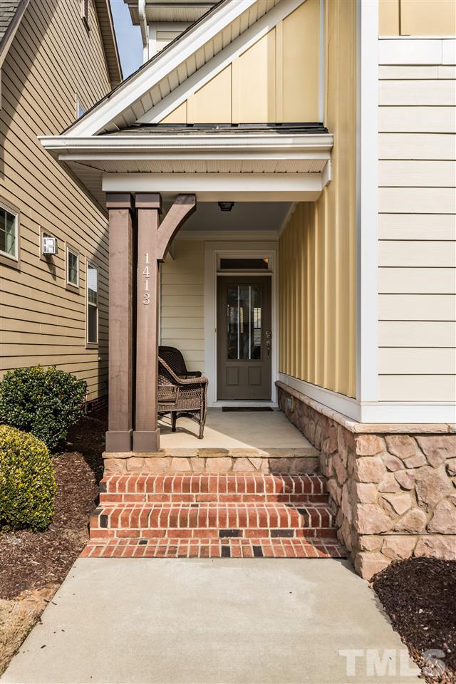 1413 Van Page Boulevard Raleigh, NC 27607 - Photo 2 of 25 a front view of a house