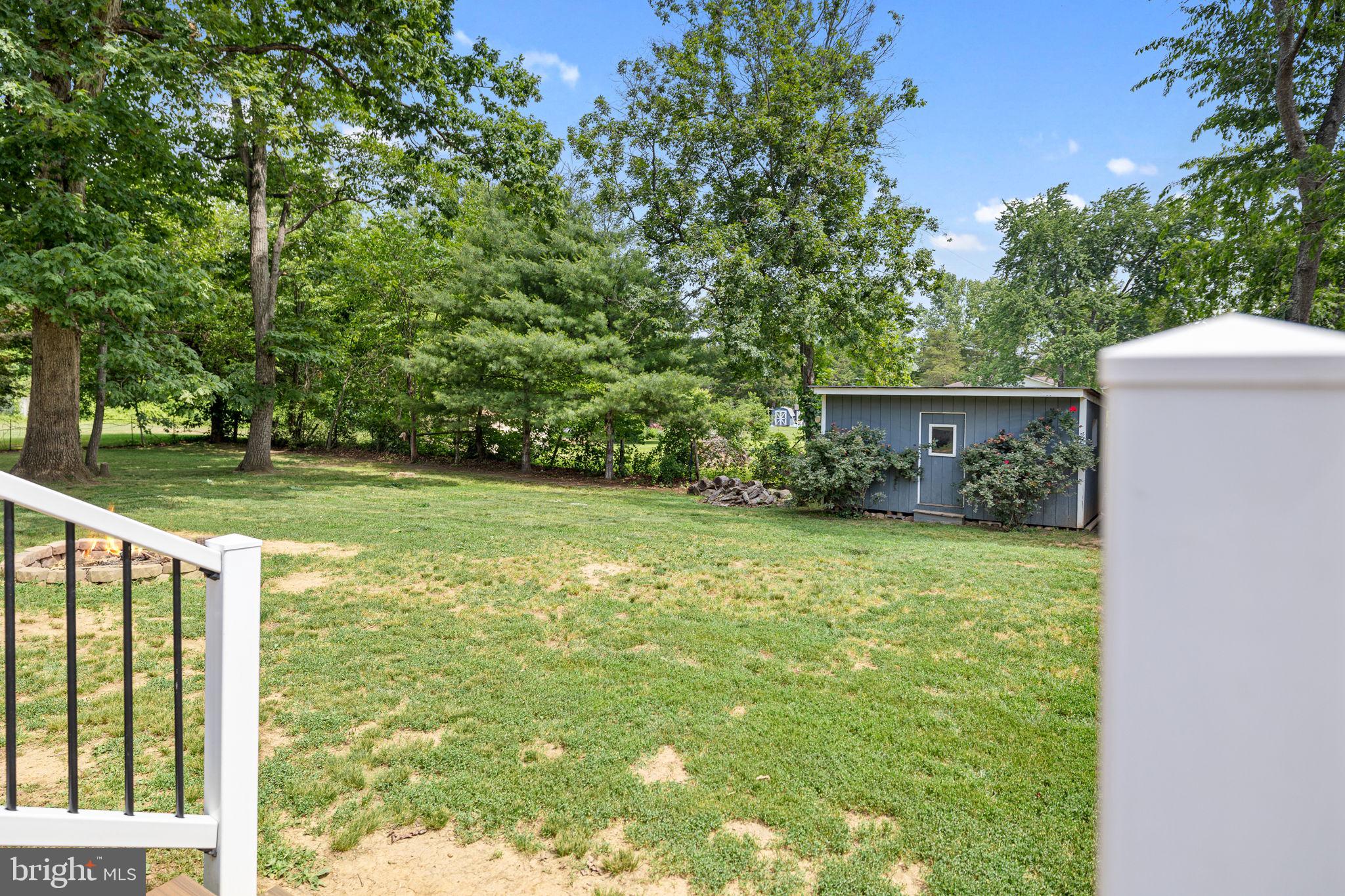 12237 Randle Lane Culpeper, VA 22701 - Photo 21 of 31 a view of a backyard with a garden