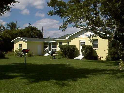 112 East Chandler Road Cloud Lake, FL 33406 - Photo 1 of 12 front