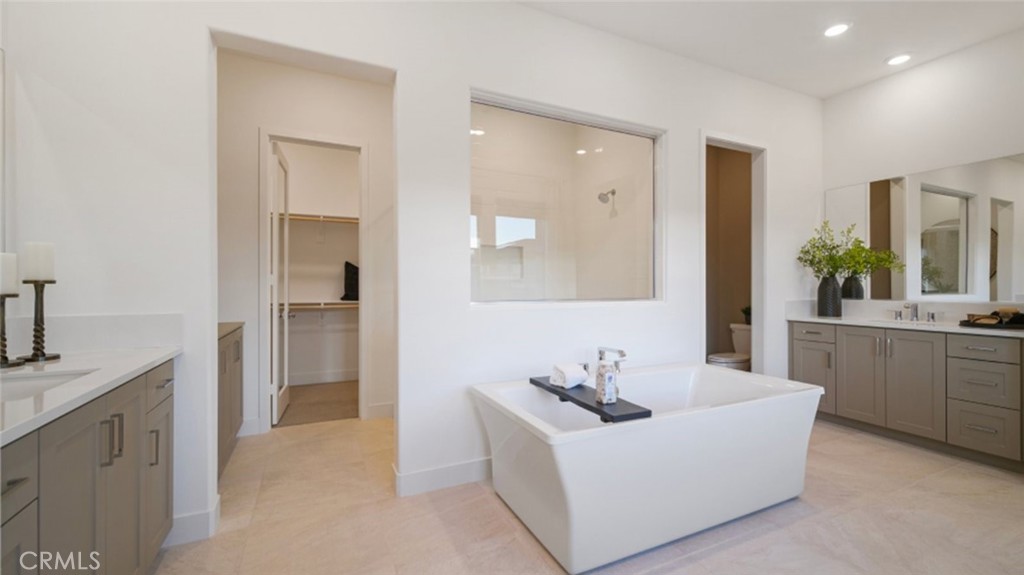 29809 Corte Trono Valencia, CA 91354 - Photo 15 of 36 a living room with furniture and a sink