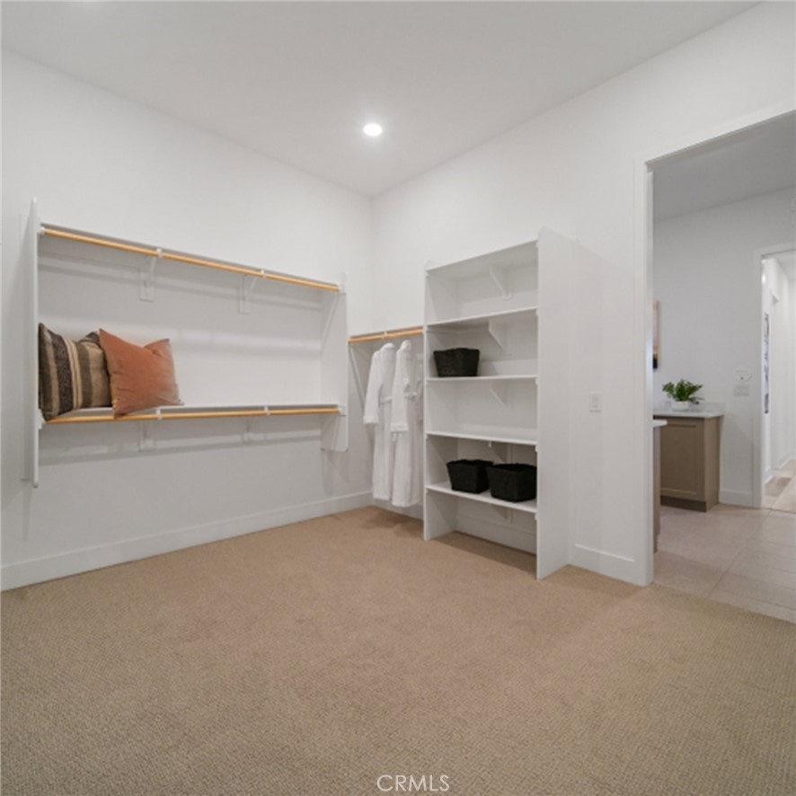 29809 Corte Trono Valencia, CA 91354 - Photo 17 of 36 a view of a livingroom with an empty space and a fireplace