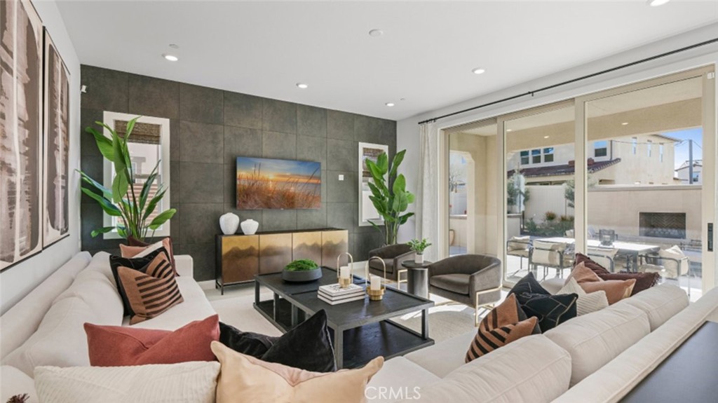 29809 Corte Trono Valencia, CA 91354 - Photo 8 of 36 a living room with furniture and a large window