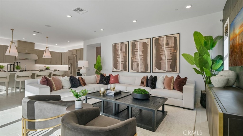 29809 Corte Trono Valencia, CA 91354 - Photo 9 of 36 a living room with furniture kitchen and a large window