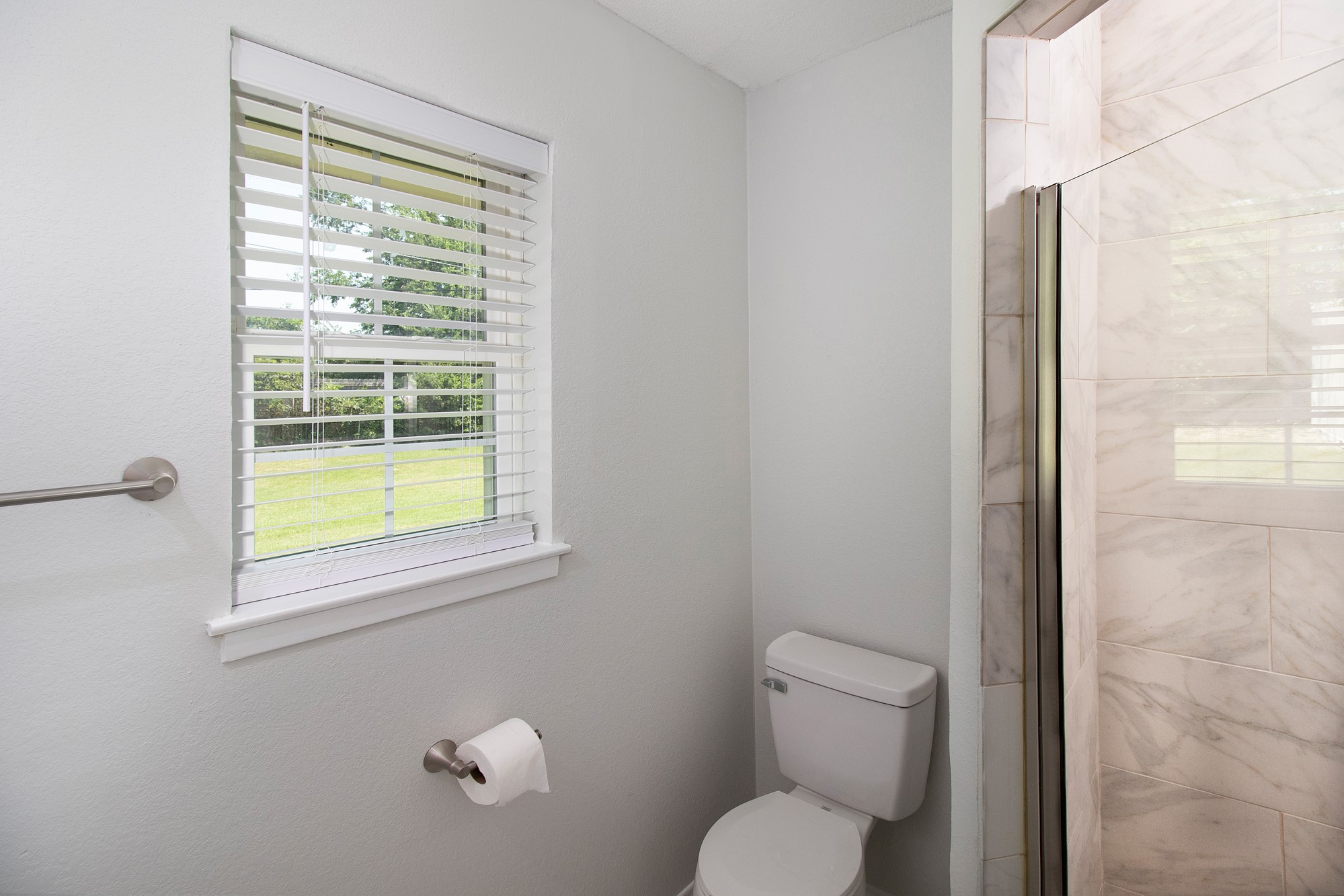 2510 Bunker Hill Drive Temple, TX 76504 - Photo 20 of 30 a bathroom with a toilet a sink and a window