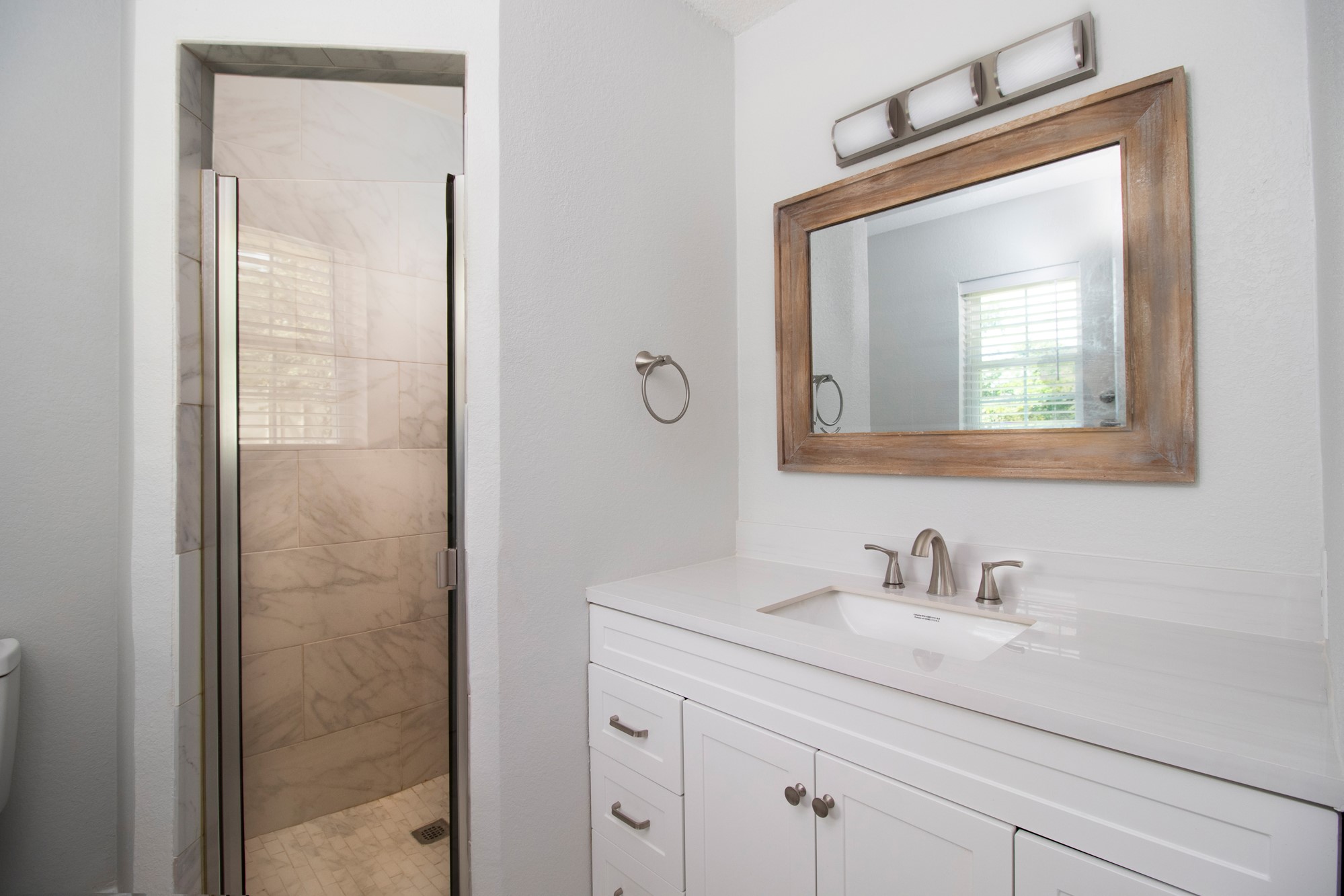 2510 Bunker Hill Drive Temple, TX 76504 - Photo 21 of 30 a bathroom with a shower a sink and mirror