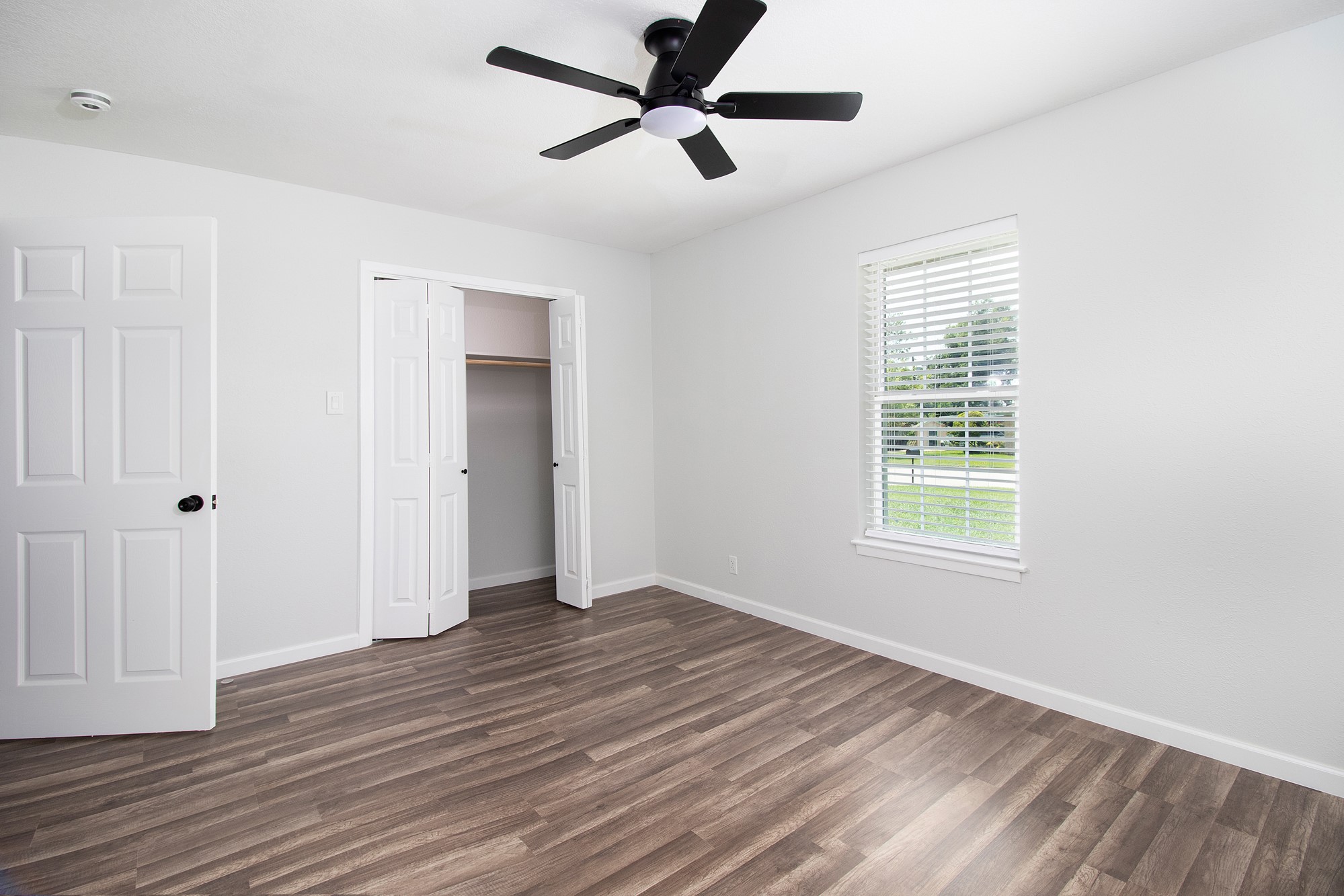 2510 Bunker Hill Drive Temple, TX 76504 - Photo 22 of 30 a view of an empty room with wooden floor and a window