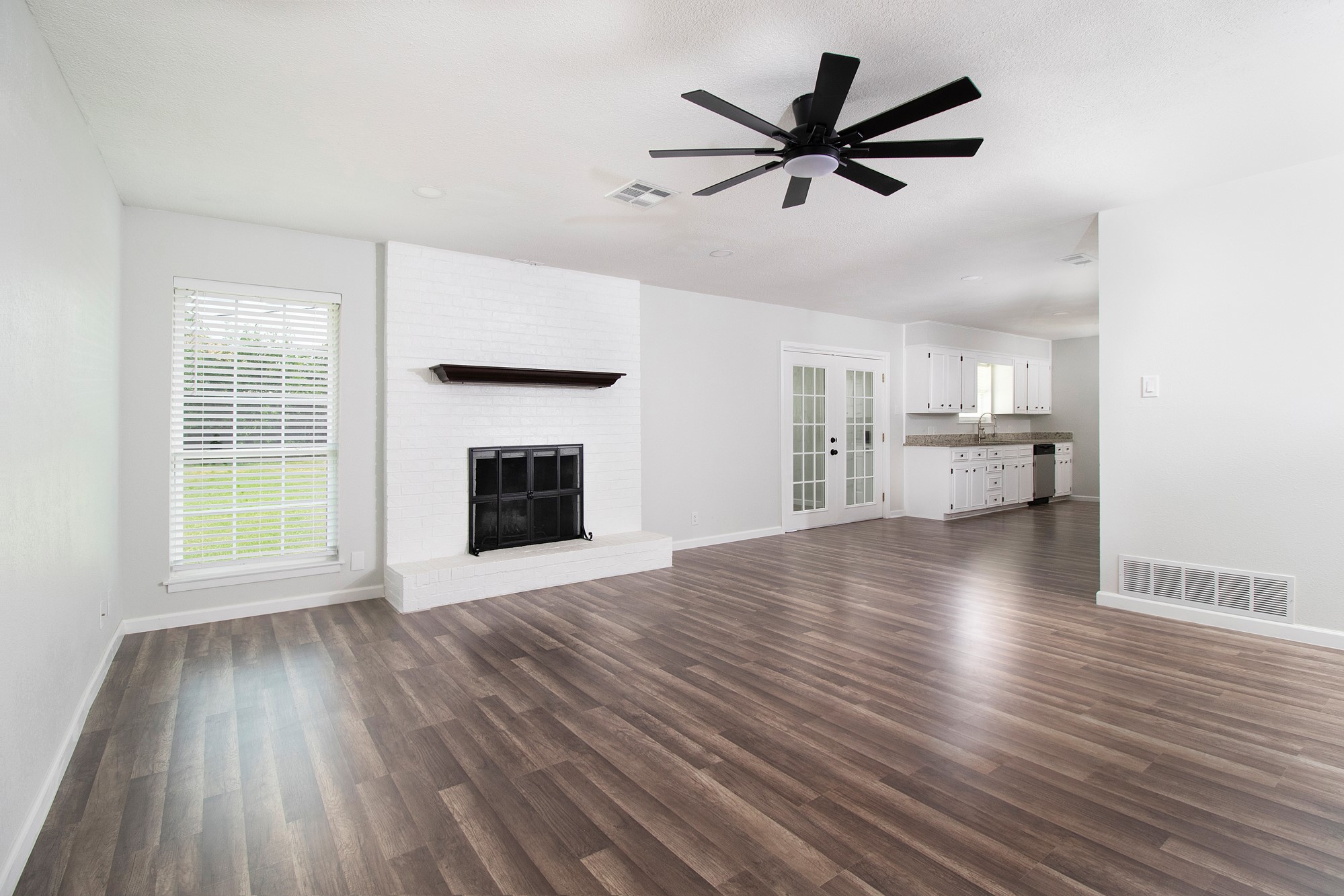 2510 Bunker Hill Drive Temple, TX 76504 - Photo 7 of 30 a view of empty room with wooden floor and fireplace