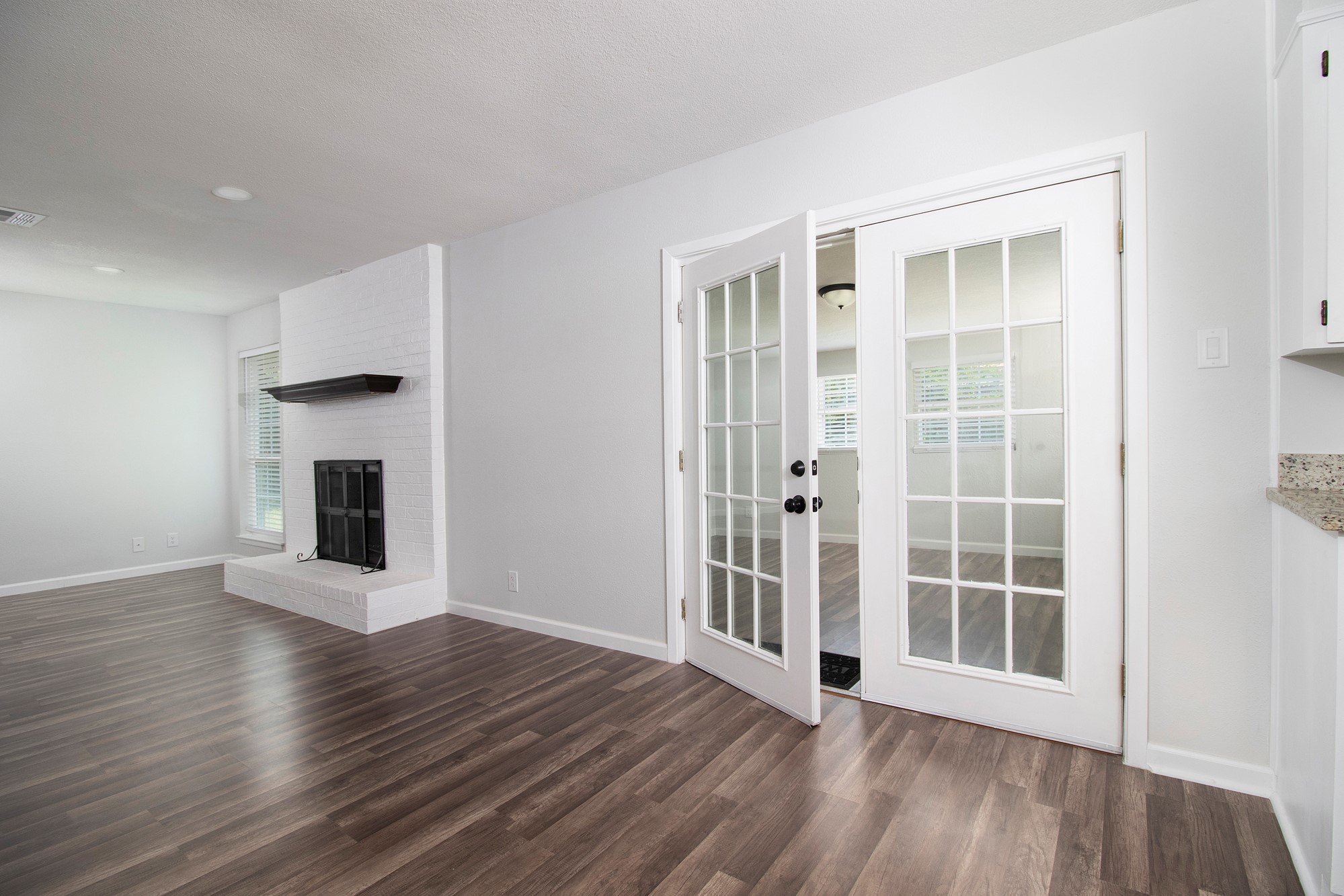2510 Bunker Hill Drive Temple, TX 76504 - Photo 9 of 30 a view of an empty room with wooden floor and a window