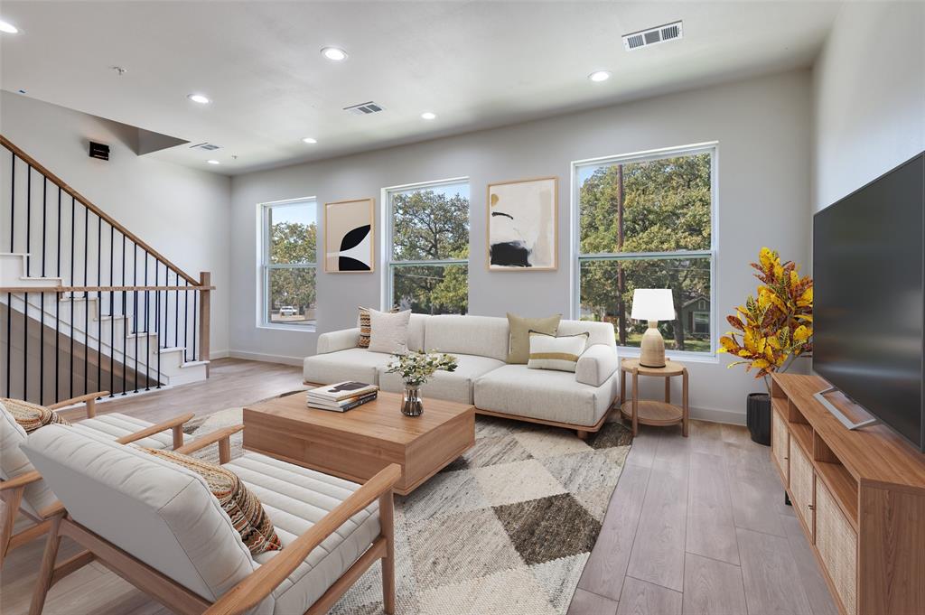 516 South O Connor Road Irving, TX 75060 - Photo 15 of 40 a living room with furniture and a flat screen tv