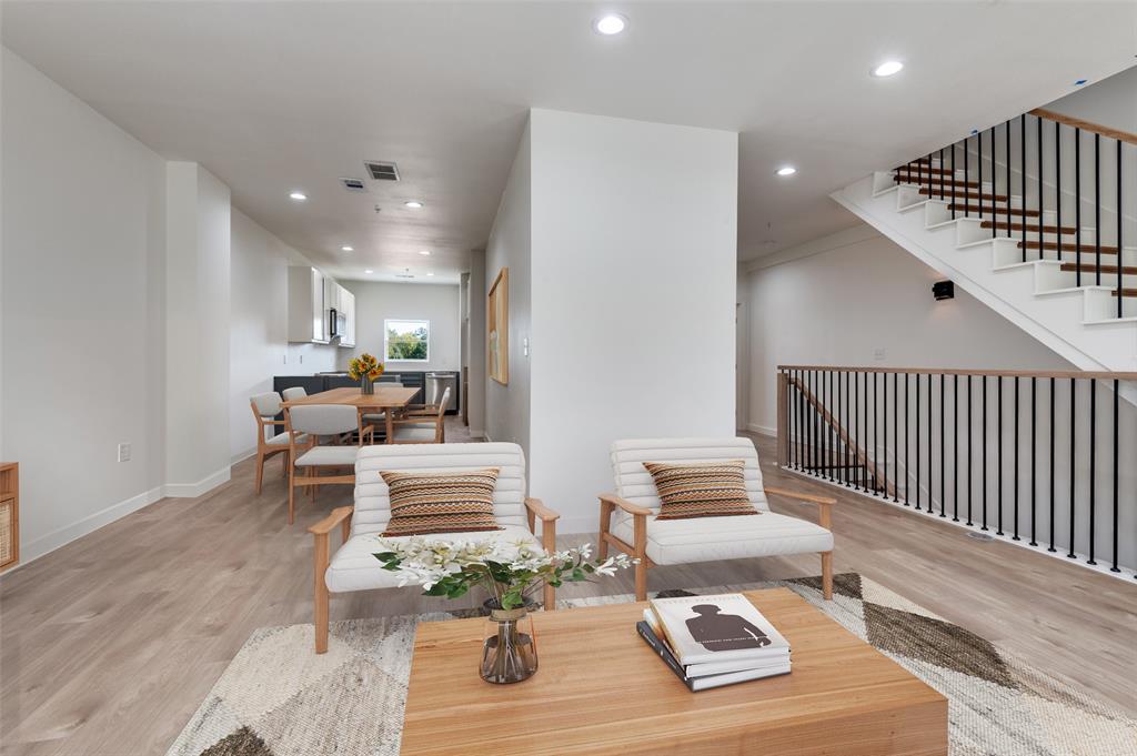 516 South O Connor Road Irving, TX 75060 - Photo 20 of 40 a living room with furniture and wooden floor