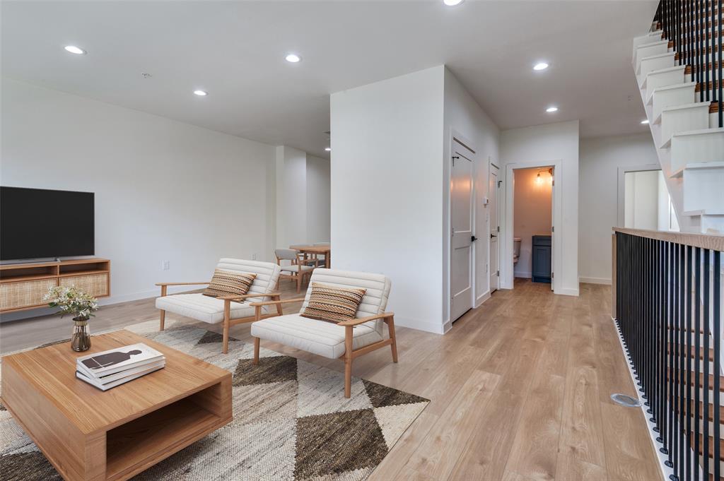 516 South O Connor Road Irving, TX 75060 - Photo 22 of 40 a living room with furniture and a flat screen tv