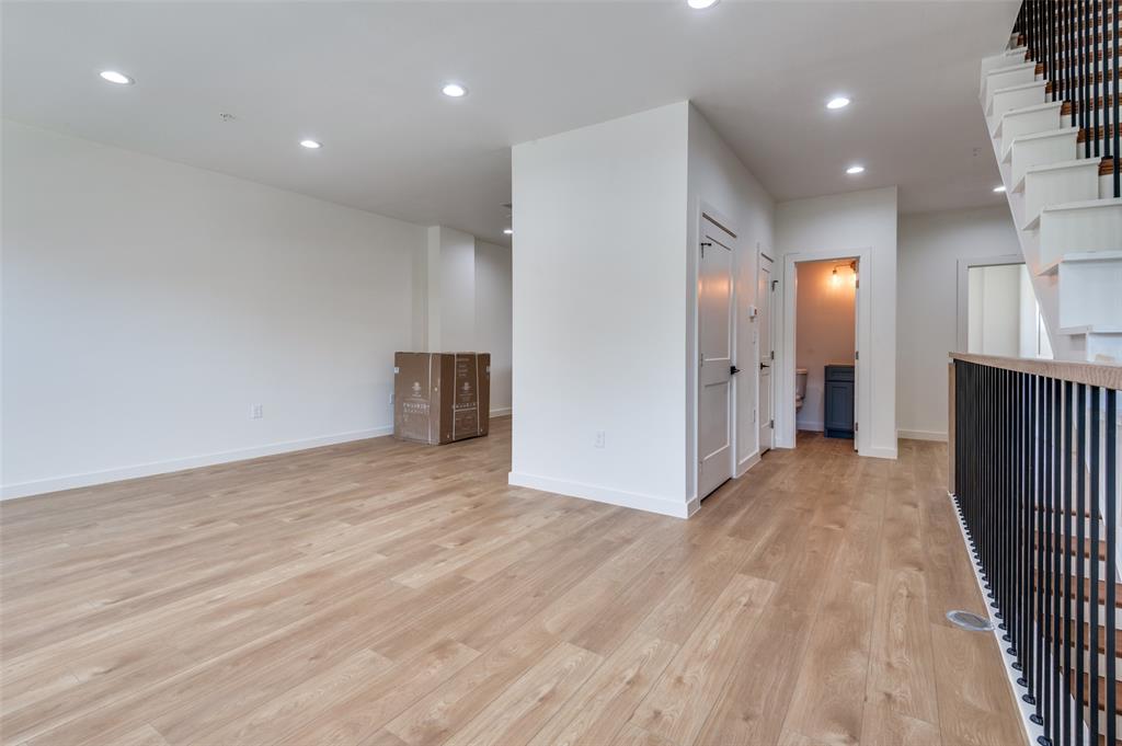 516 South O Connor Road Irving, TX 75060 - Photo 23 of 40 a view of a hallway with wooden floor